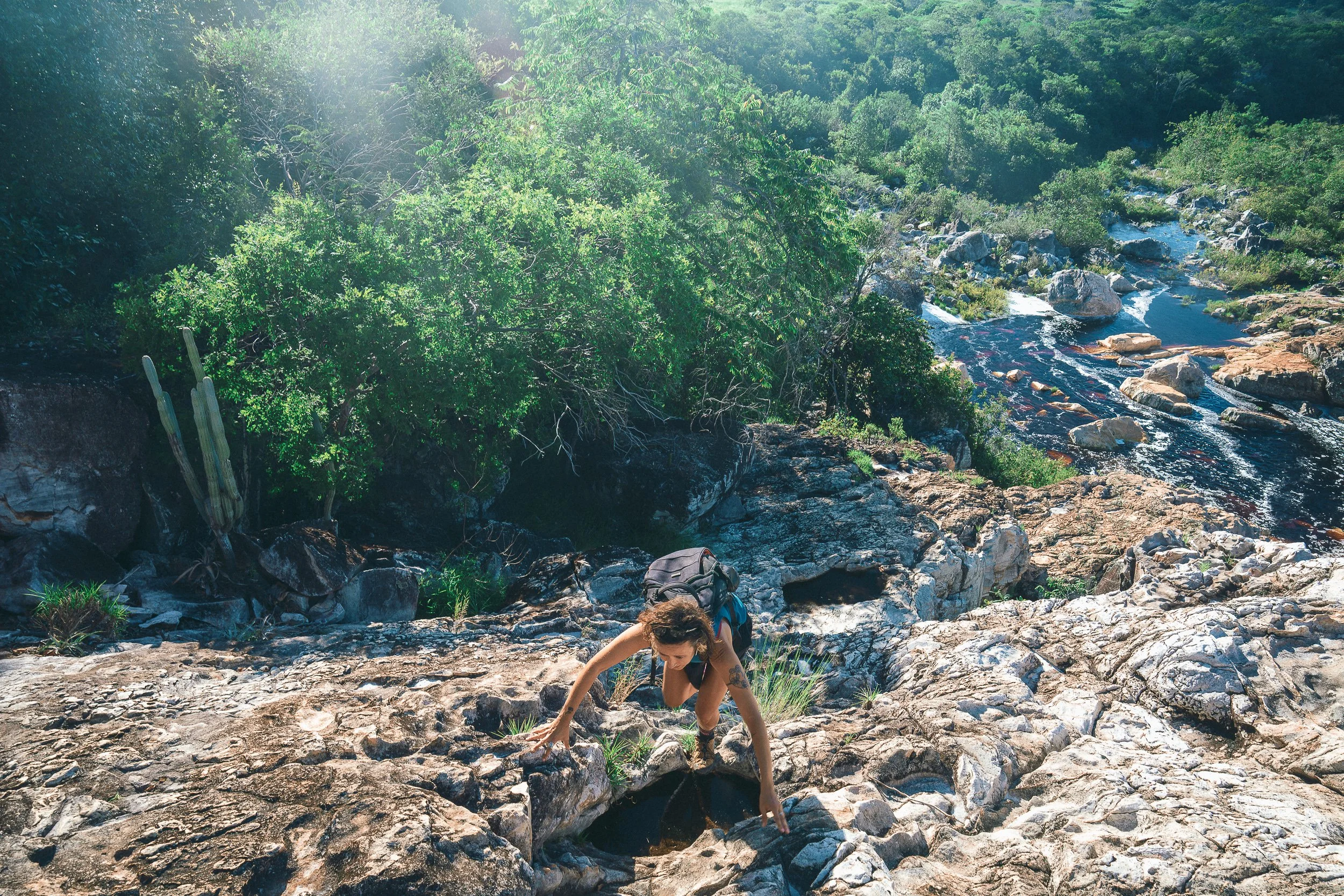 Rock climbing in search of waterfalls in Curimatai, Serra do Espinhaço