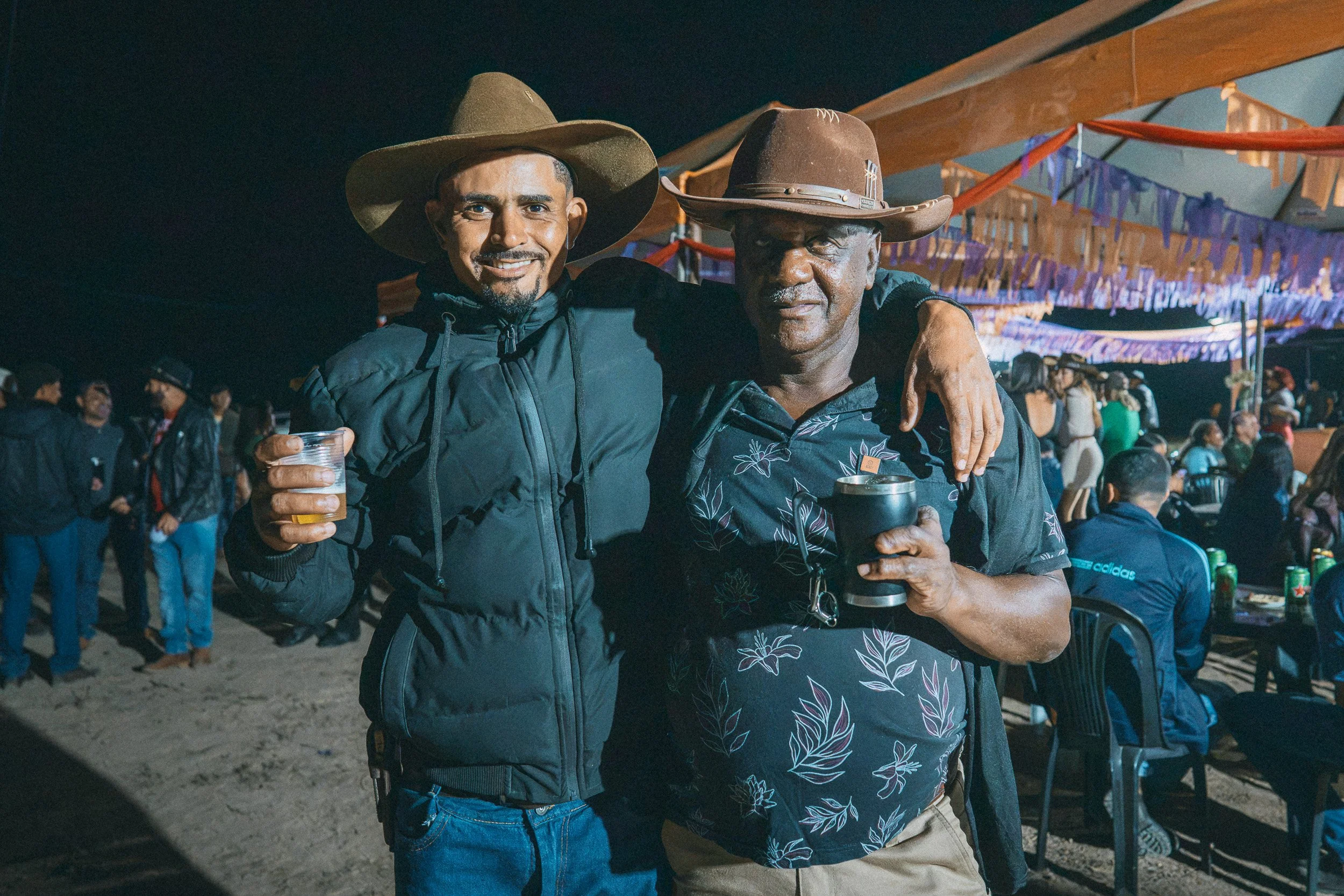 A portrait of a father and son at the annual festival in Santa Rita, Serra do Espinhaço