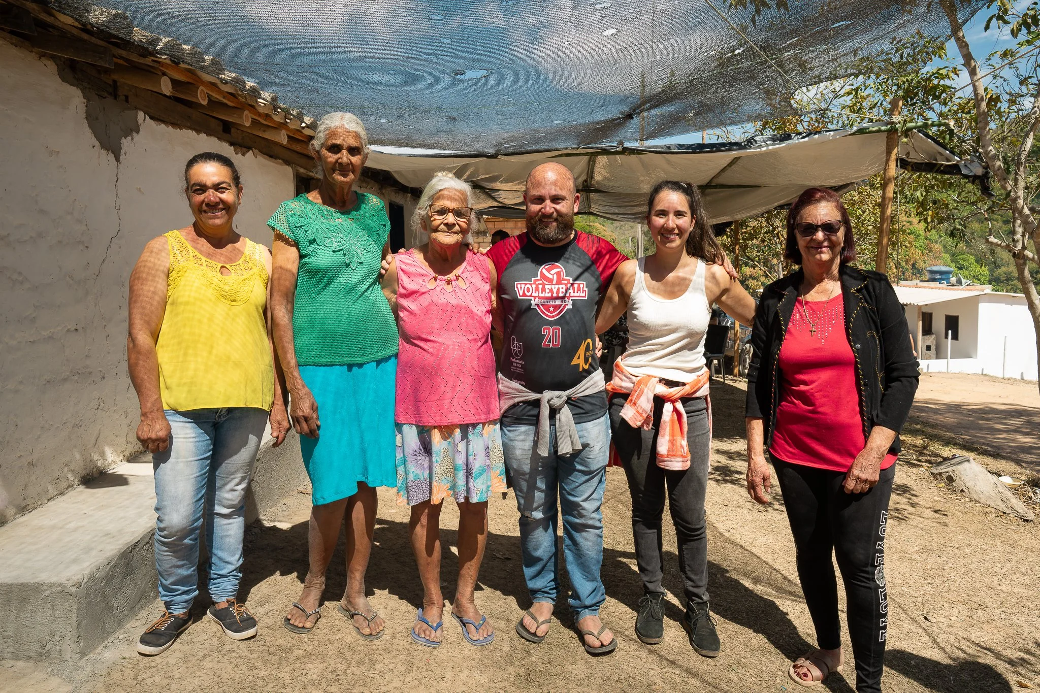 Elisa with locals at the annual festival in Cemitério do Peixe, Minas Gerais