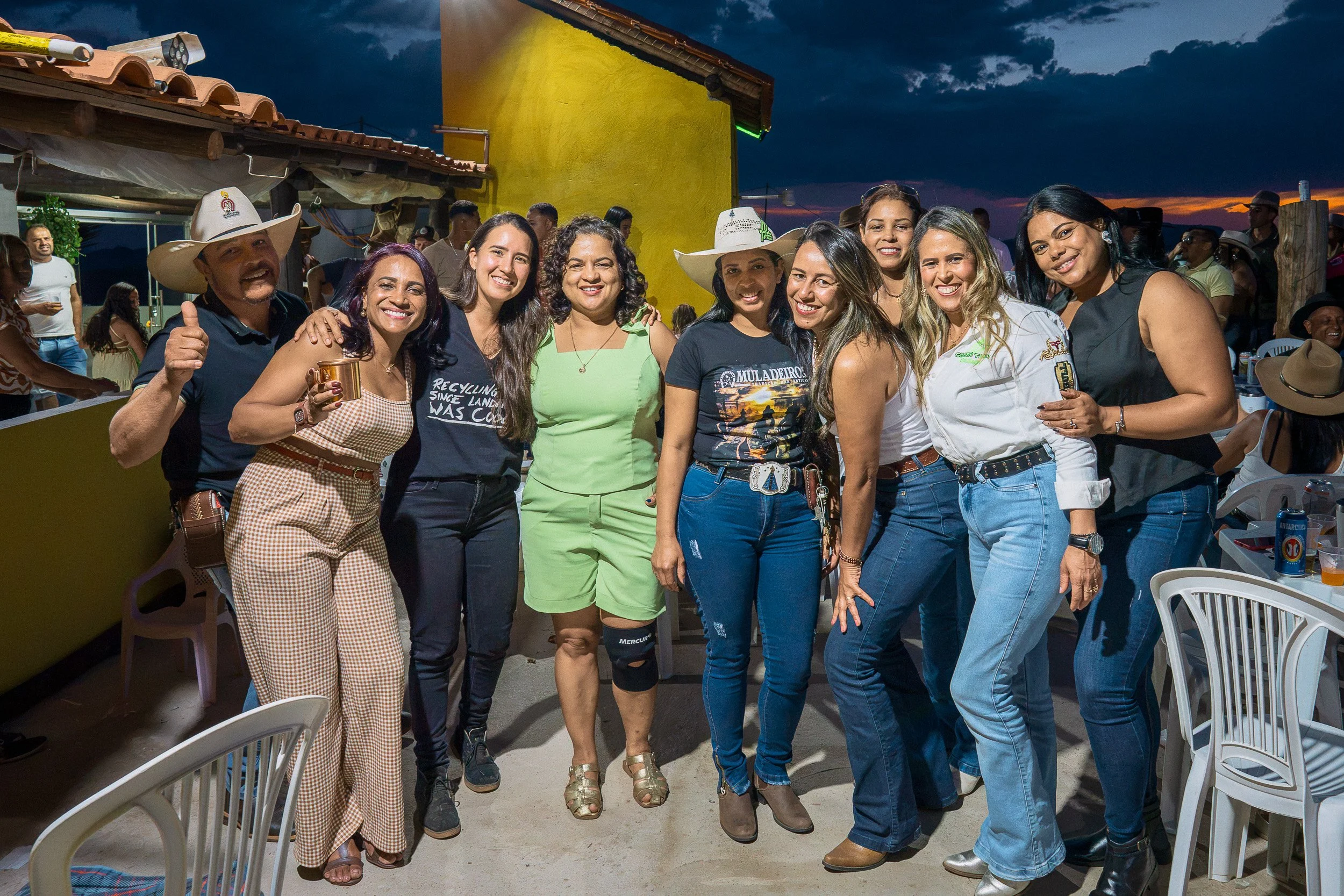 Elisa, second from left, poses with women from Santa Rita during Branquinho’s 50th birthday party near Guinda, Diamantina.