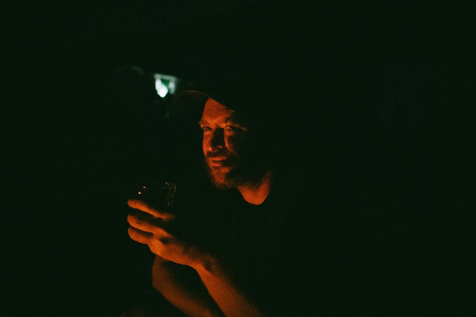 Drinking cachaça by the campfire in Vale do Patí, Chapada Diamantina