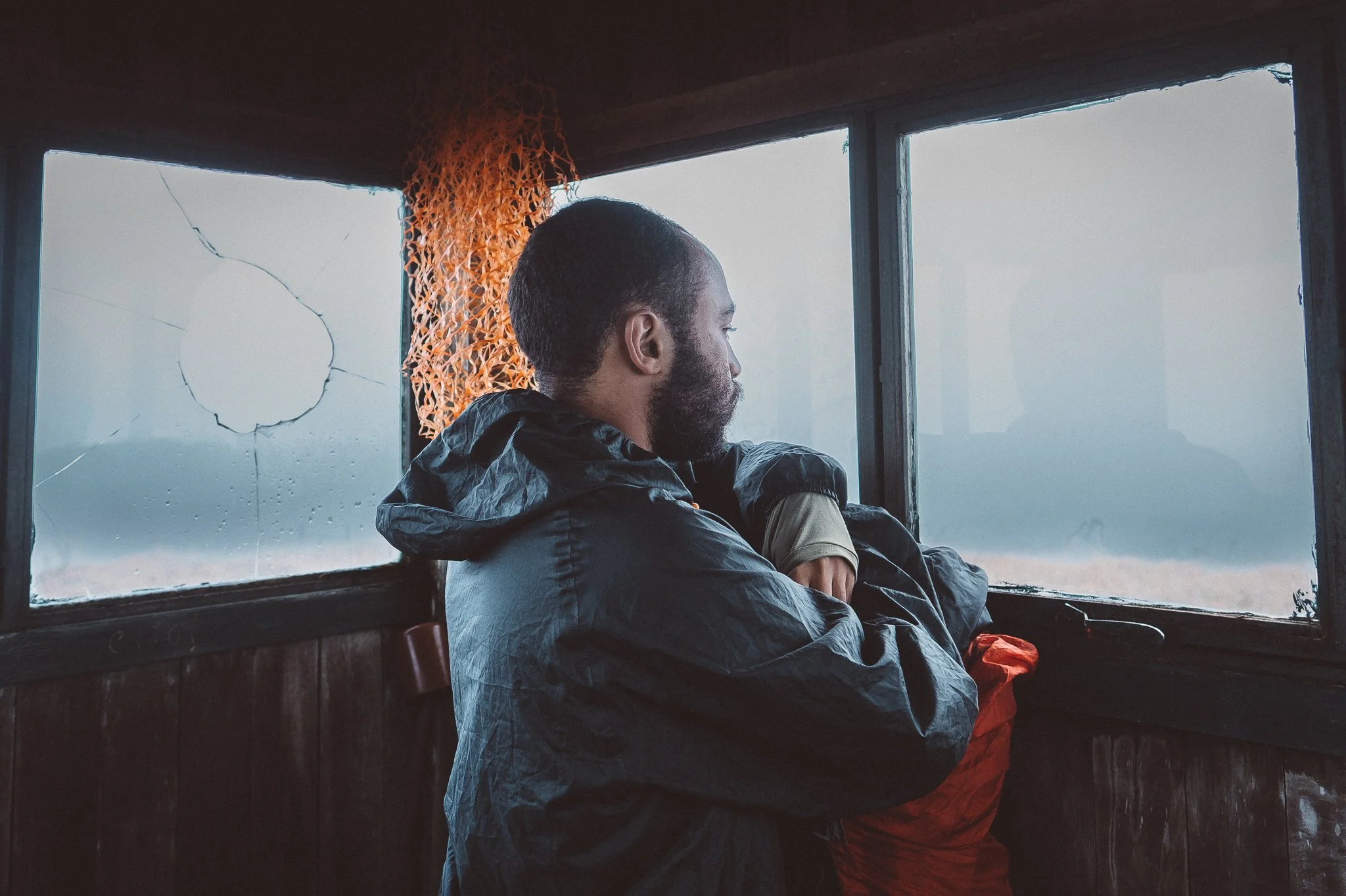 Júlio waiting for the storm to clear in the small shelter atop the Chapada do Couto, Rio Preto State Park