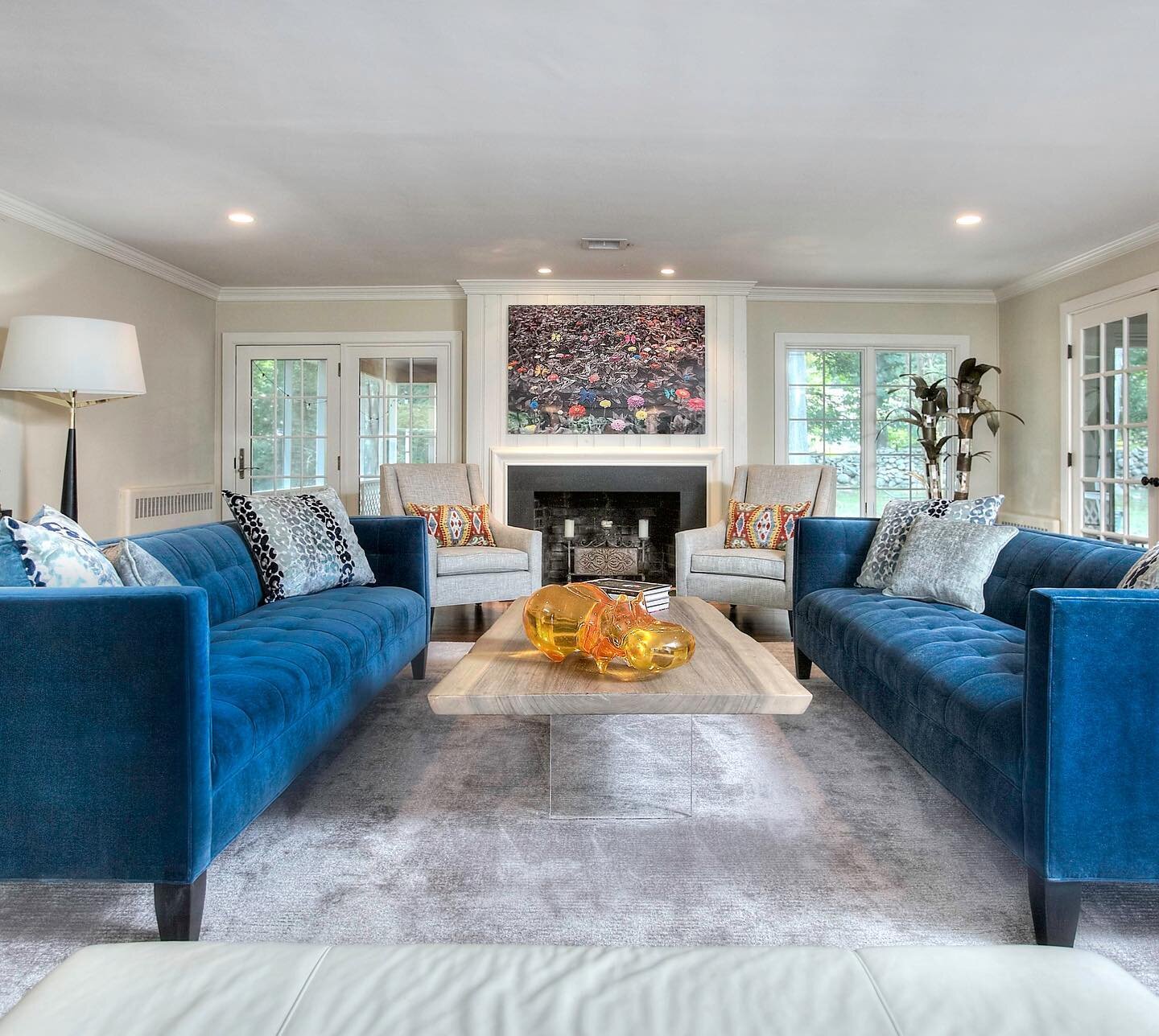 The b+w Colorful Butterfly Meadow by Israeli artist Isack Kousnsky became the centerpiece for the adventure in color and other collectibles for this family&rsquo;s living room.#francinecorriganinterior#isackkousnsky #coastalct @isackkousnskystudio