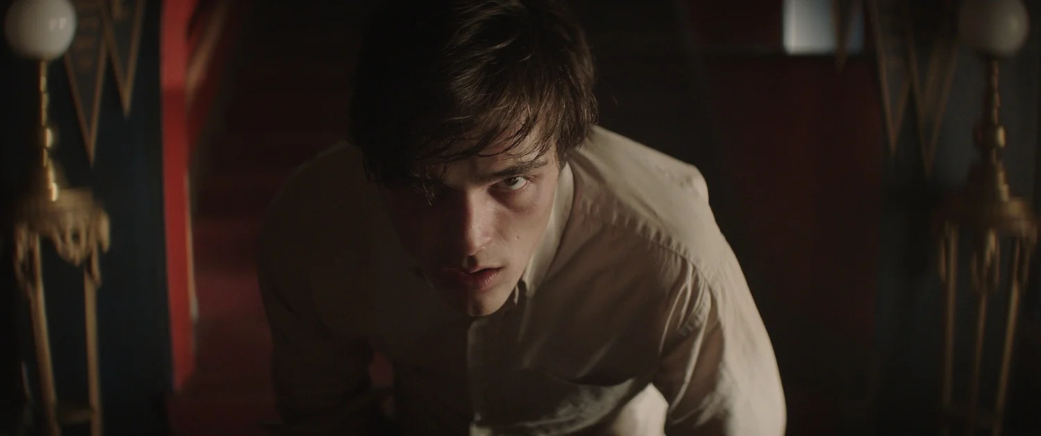 Jacob Elordi in The Mortuary Collection, hallway scene