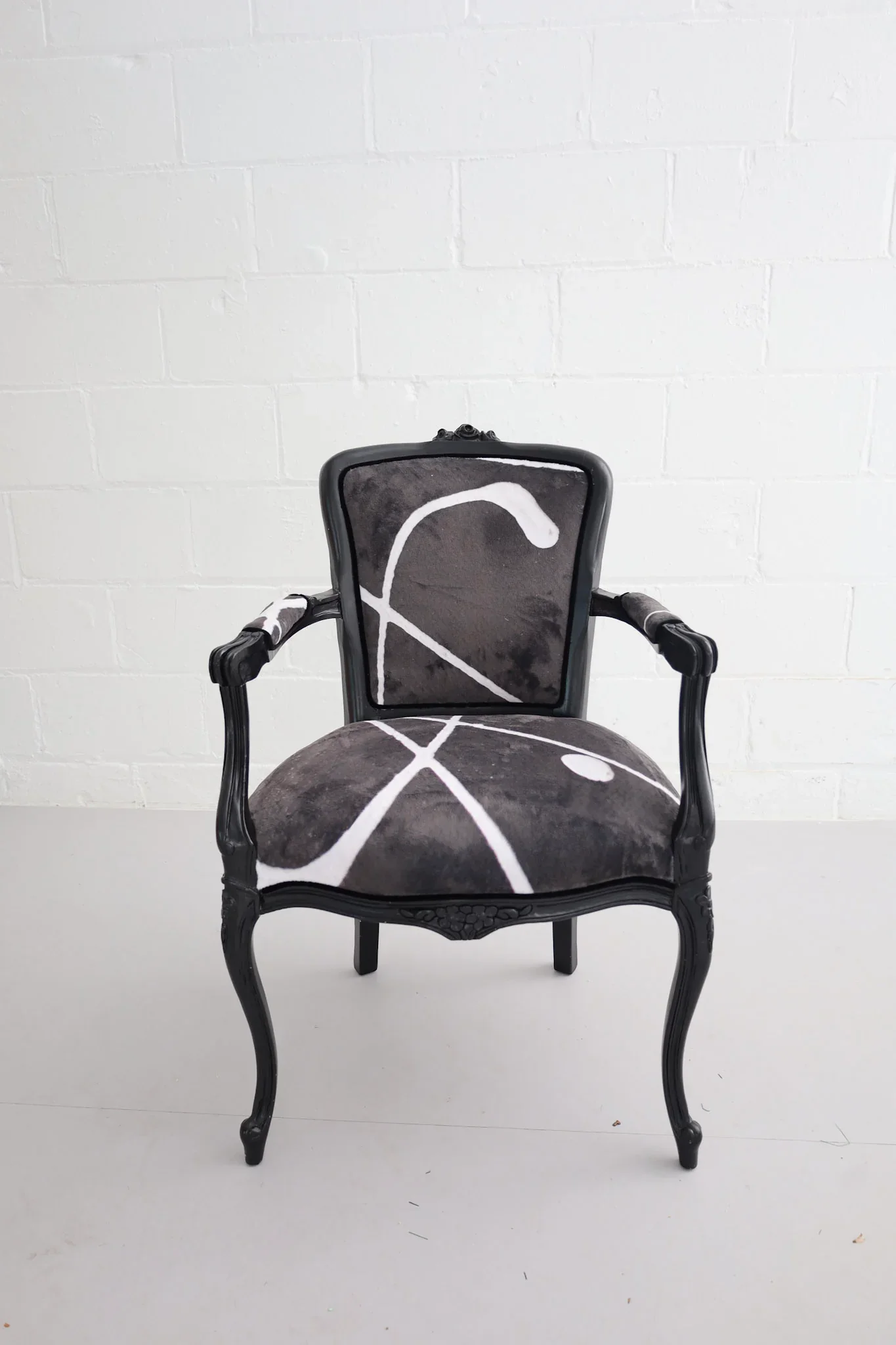 BlackVintageChair_Upholstery.webp