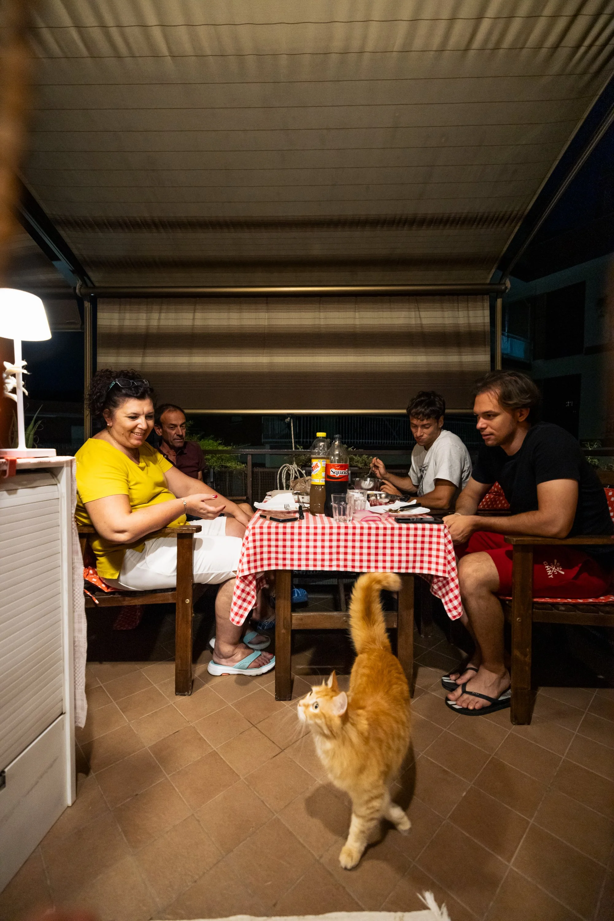 Melezi family having dinner. A reportage about how young Italian people live with their parents due to the high living costs in Italy.