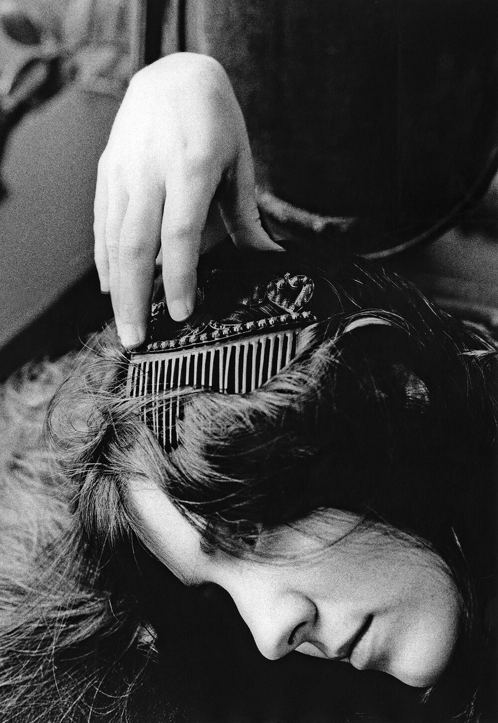 Maura Sullivan TWR woman with comb.jpg