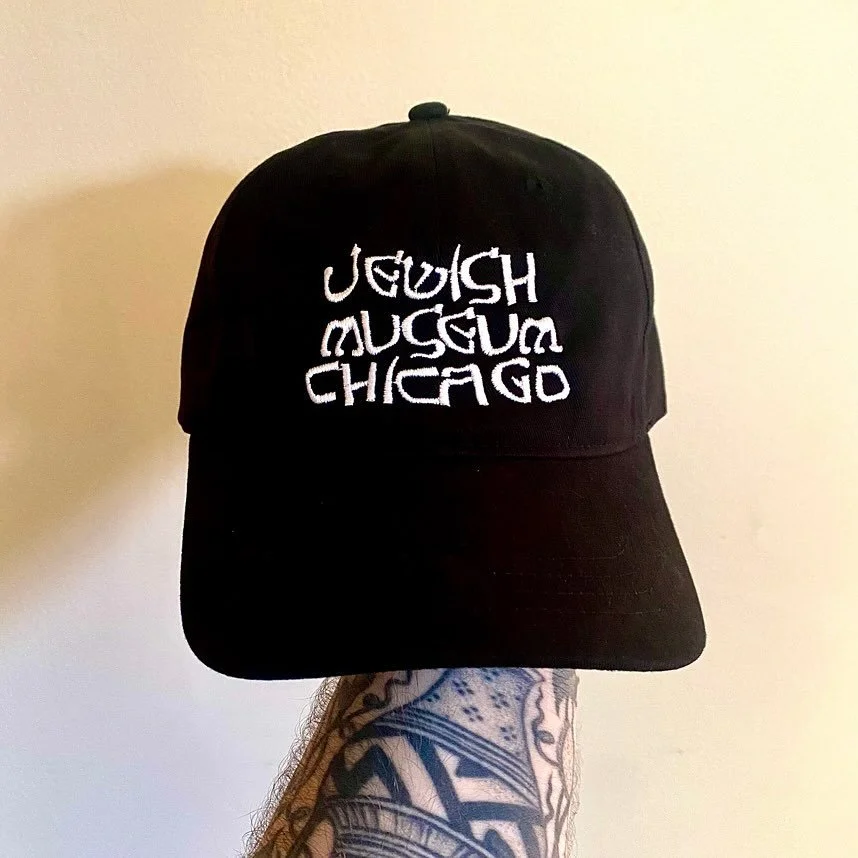 Looking for ways to support our programming? Consider buying one of our new cozy embroidered caps! Great for falling acorn protection when you’re sitting under a tree and looking stylish during all your 5785 new year socializing! 
Please help