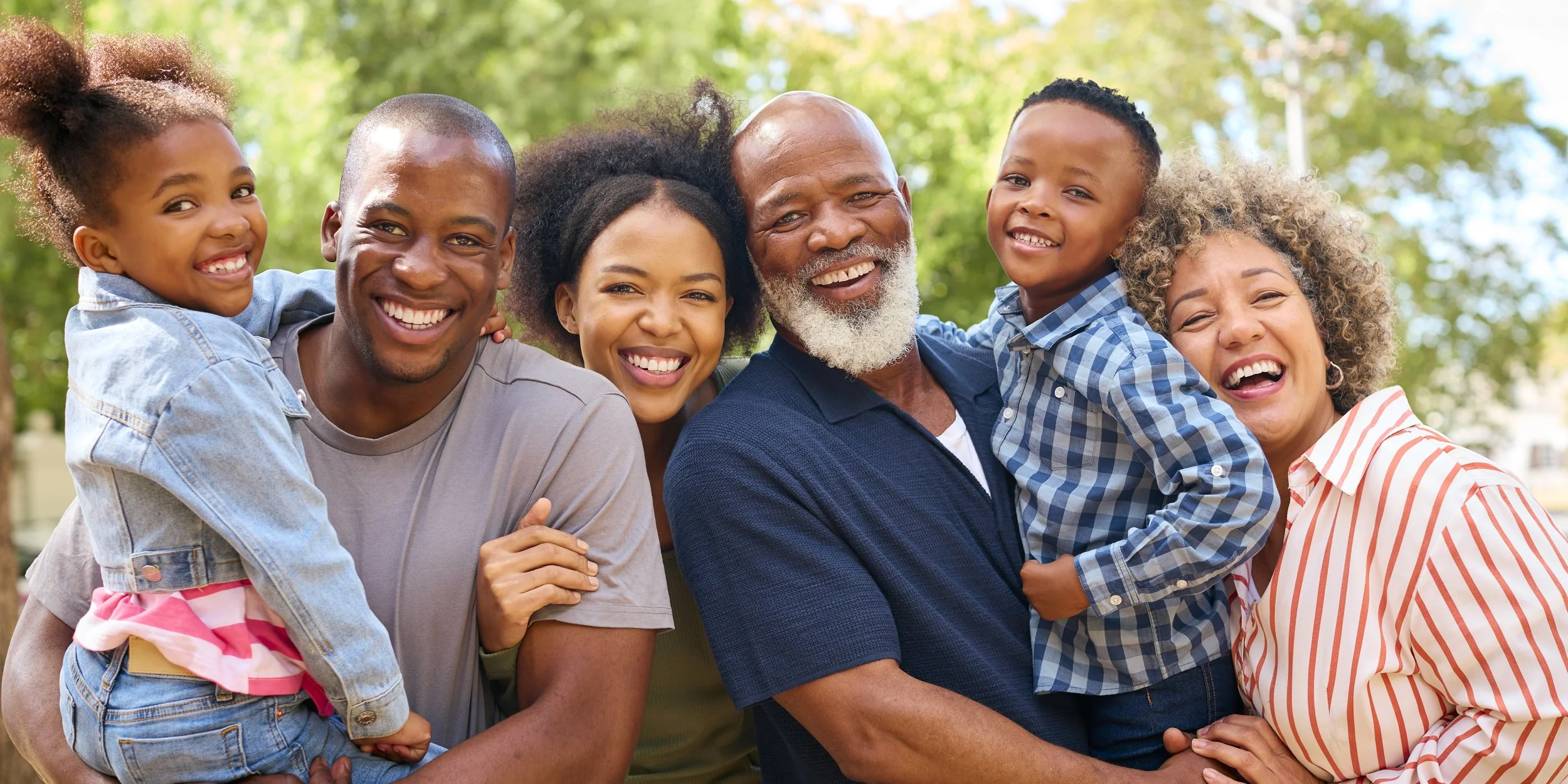 Picture of family smiling happily