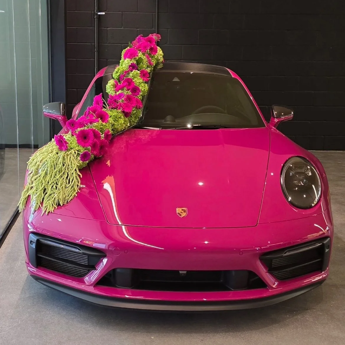 On Saturday, we had the pleasure of attending the FCS Leading Lights Gala, supporting Family & Children’s Services of Monmouth County. We were thrilled to design the floral arrangements for the Shore Car Club’s display—especiall