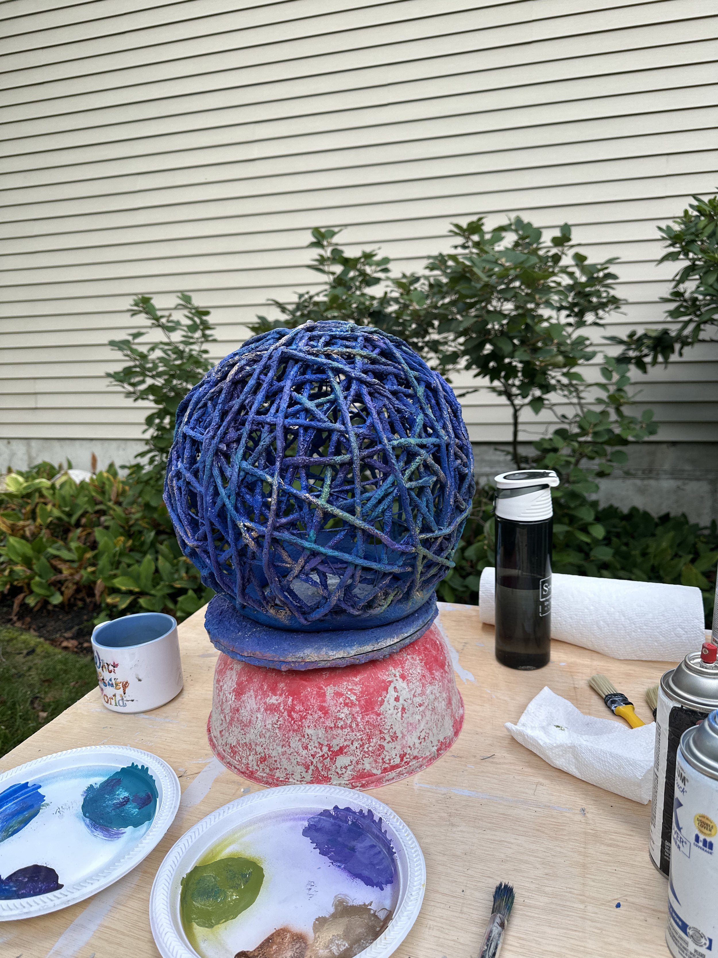 The making of the blue and purple string sphere for the Labyrinth.JPG