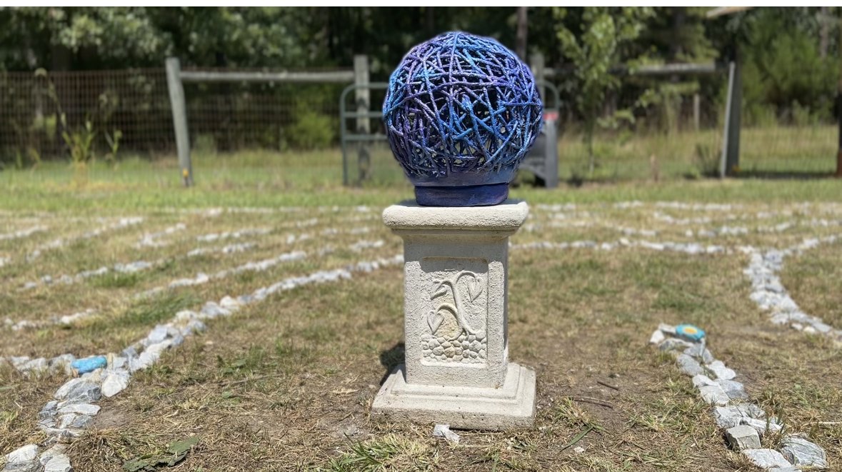 The blue and purple string sphere installed .jpeg