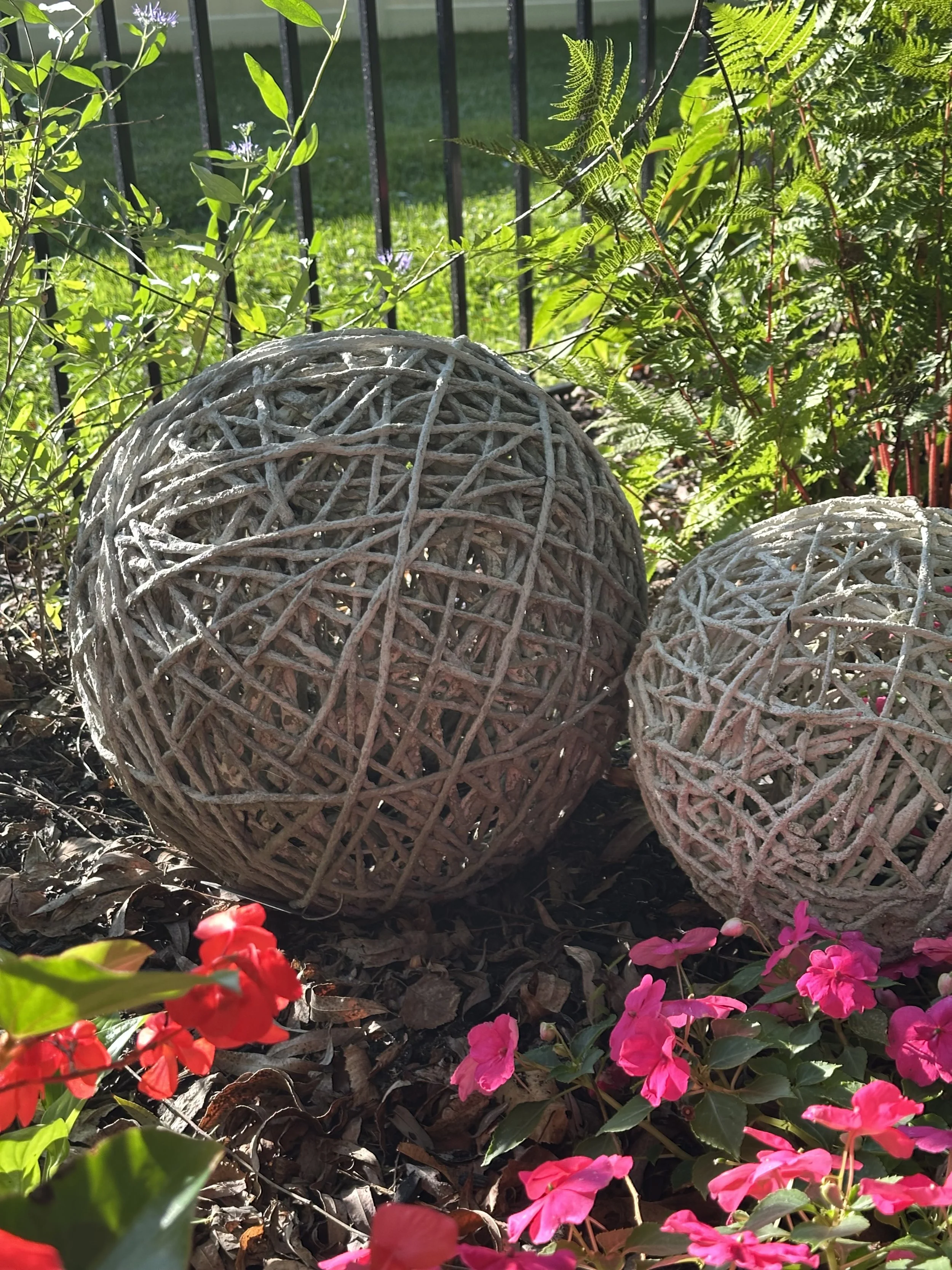 A Pair of String Spheres in a garden