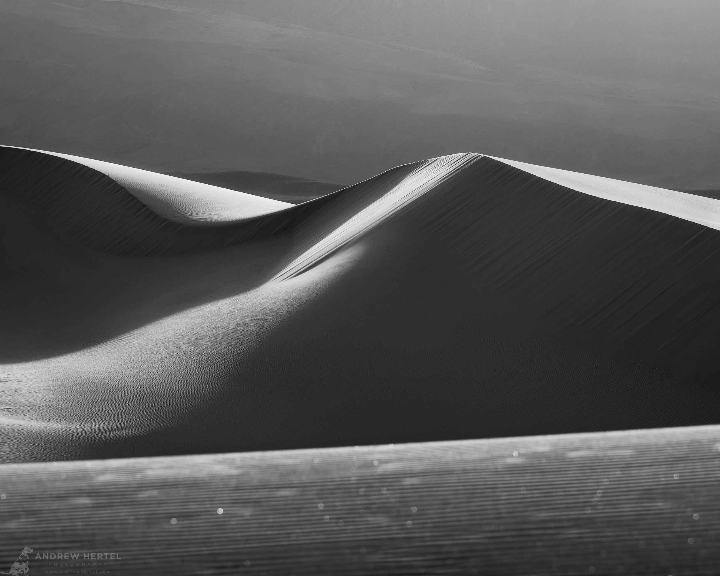 black and white fine art photograph of a large sand dune in Eureka Dunes in Death Valley National Park