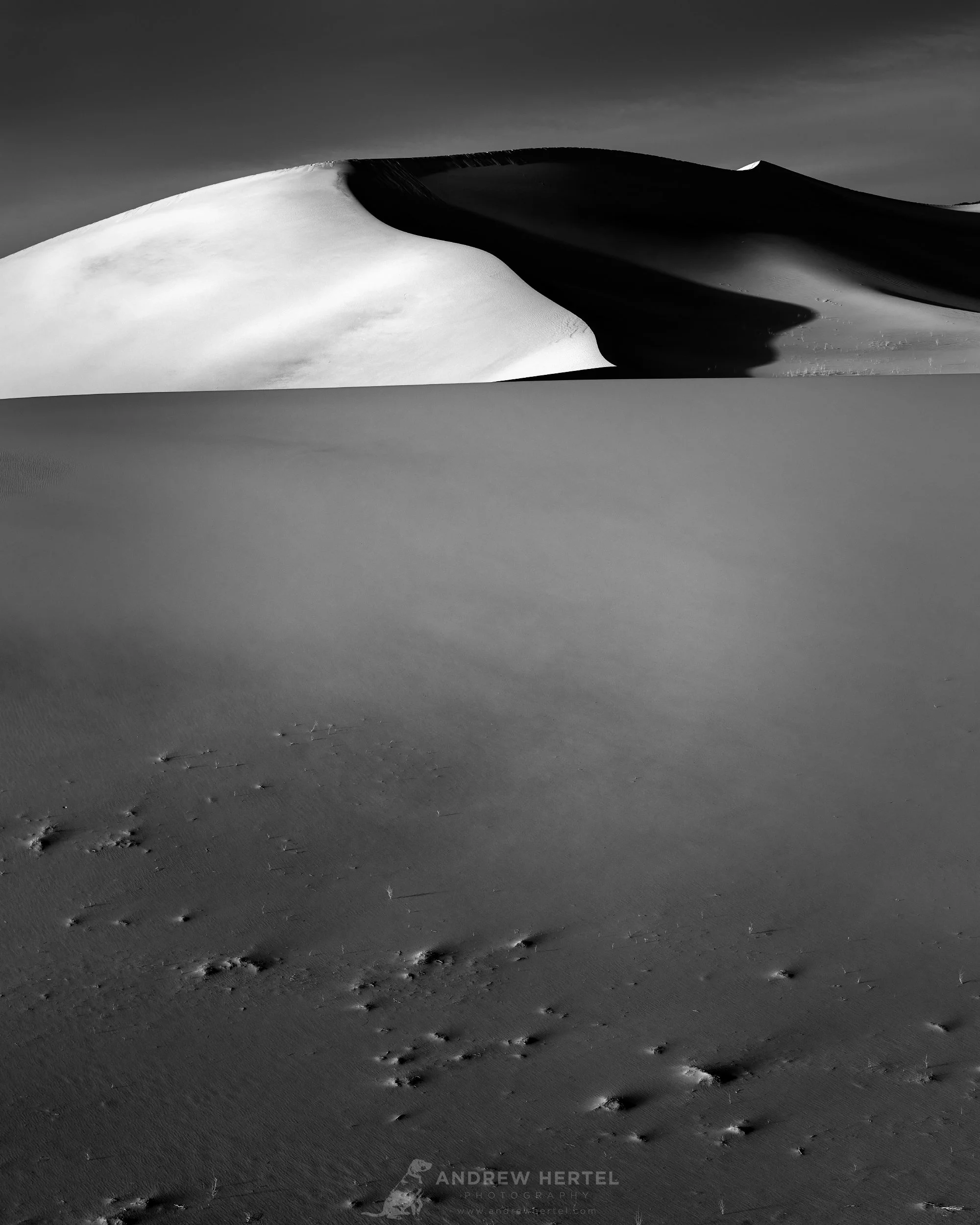  Black and white fine art photograph of sand dunes at Mesquite Dunes in Death Valley National Park.  