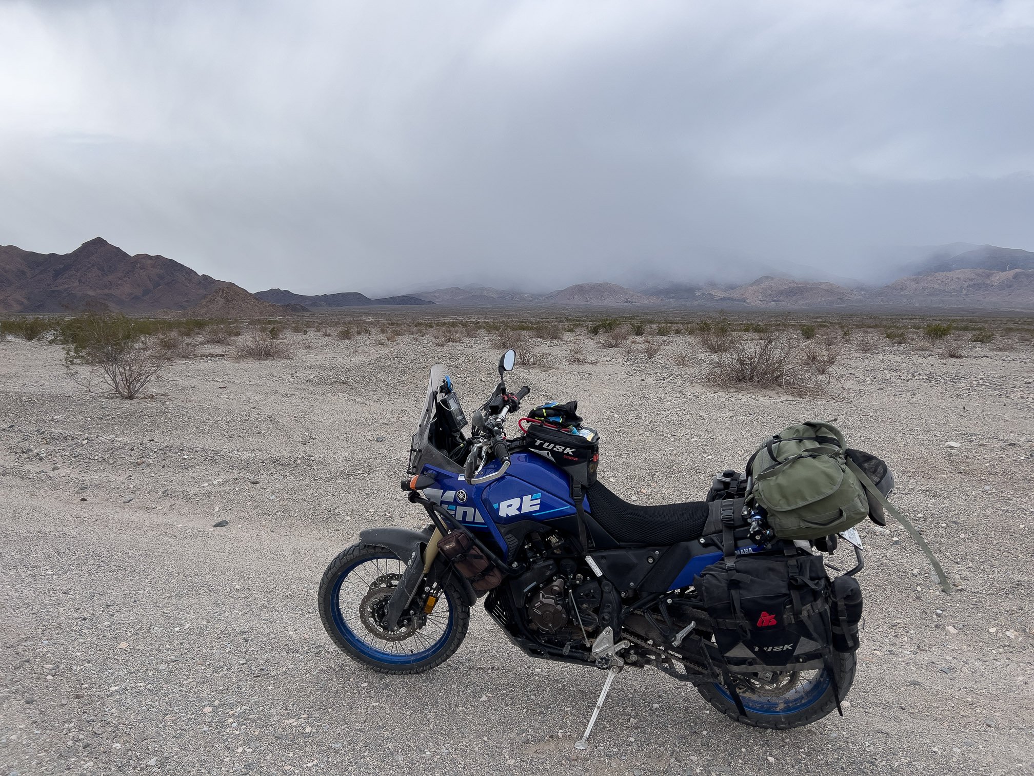 Riding a motorcycle in a storm in Death Valley