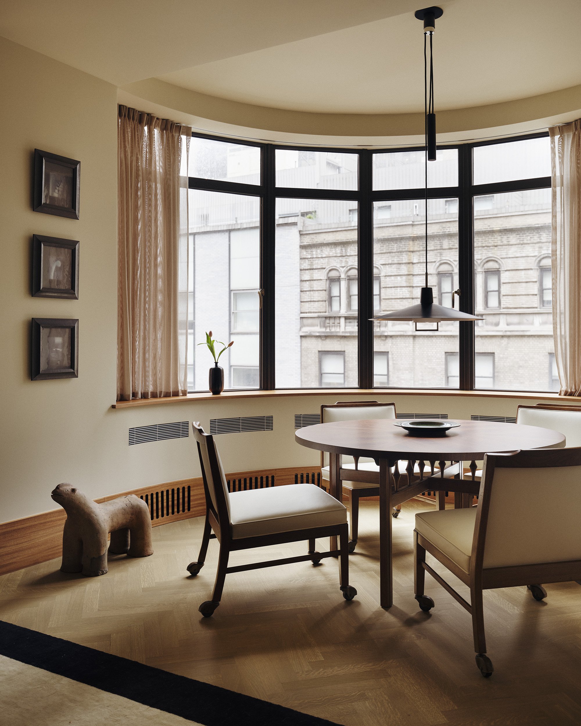 A game table in a curved bay of the Rockefeller Apartments