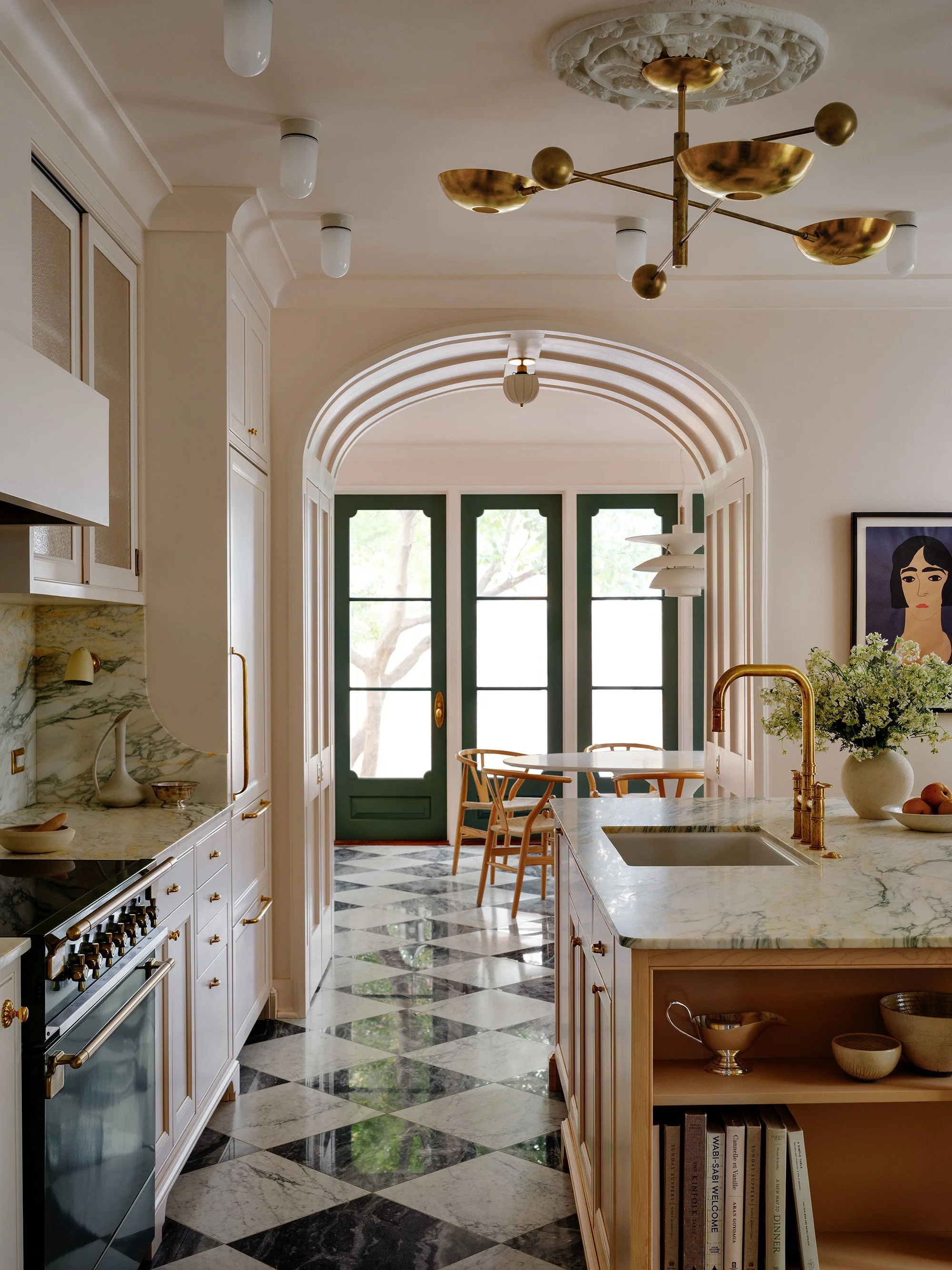 An arch in a kitchen in an historic Capitol Hill row housekitchen designed by architect Nicholas Potts
