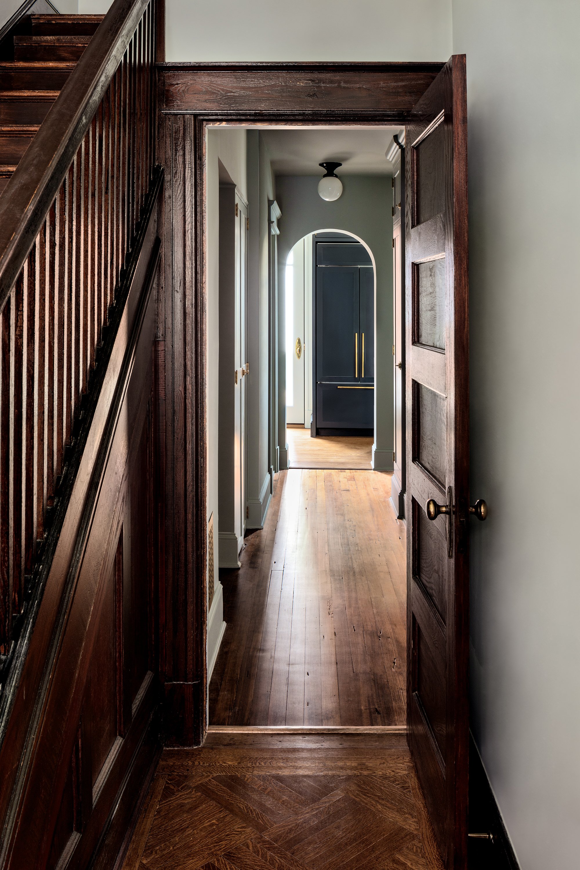 An arched entryway in a house renovated by architect Nicholas Potts