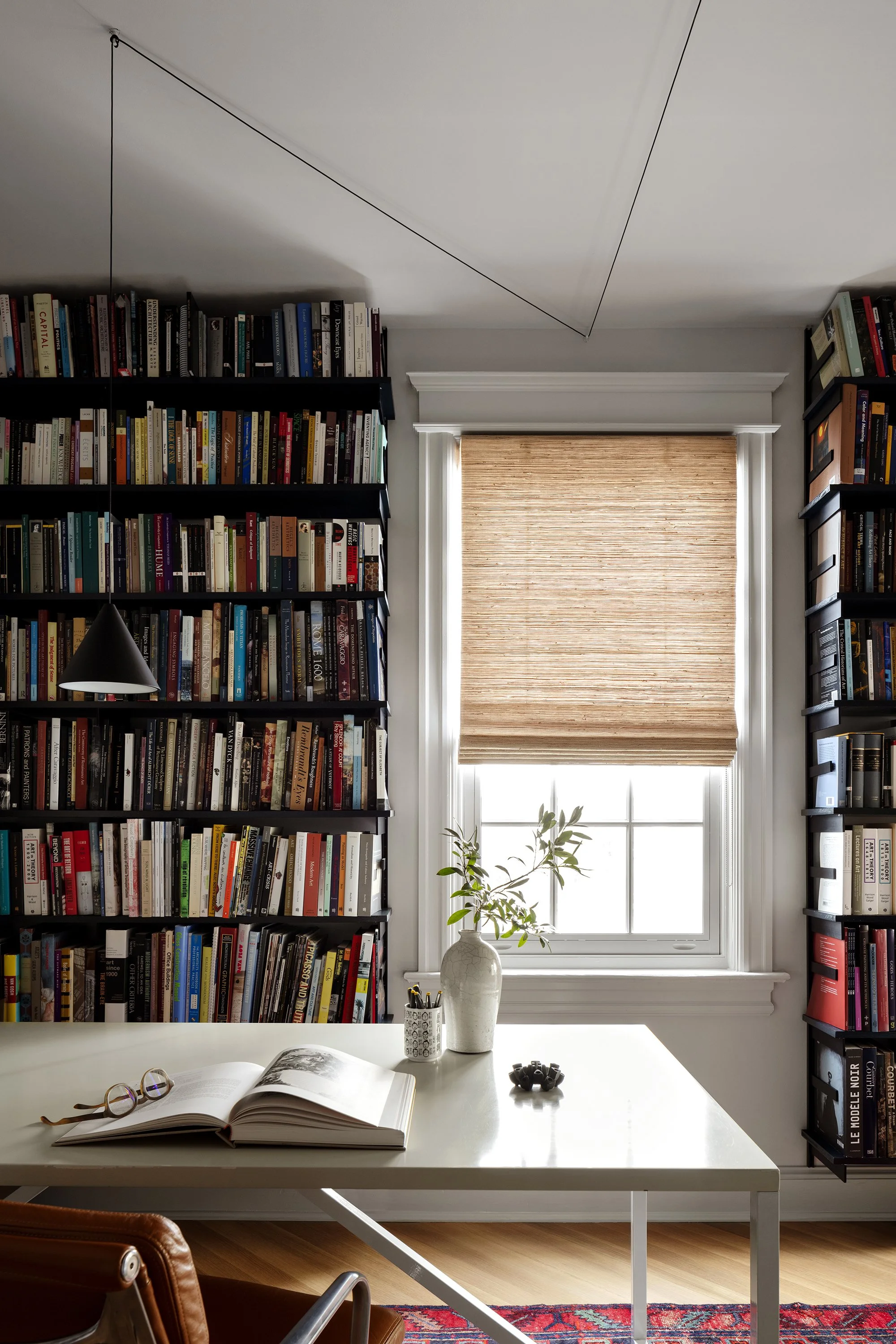A library office in an apartment designed by architect Nicholas Potts