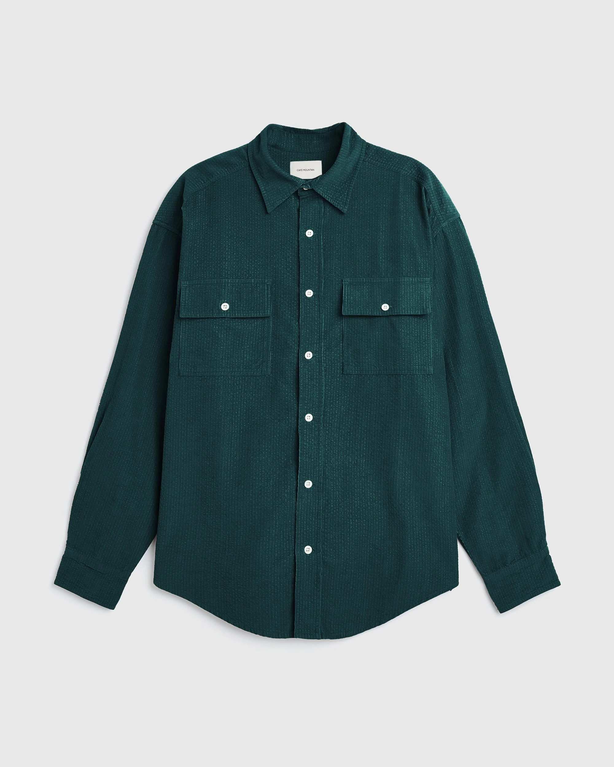 CafeTemplateCafe-Mountain_ParisShow_SS26_1DOUBLE-POCKET-SEERSUCKER-CORD-HERITAGE-SHIRT_FOREST.jpg