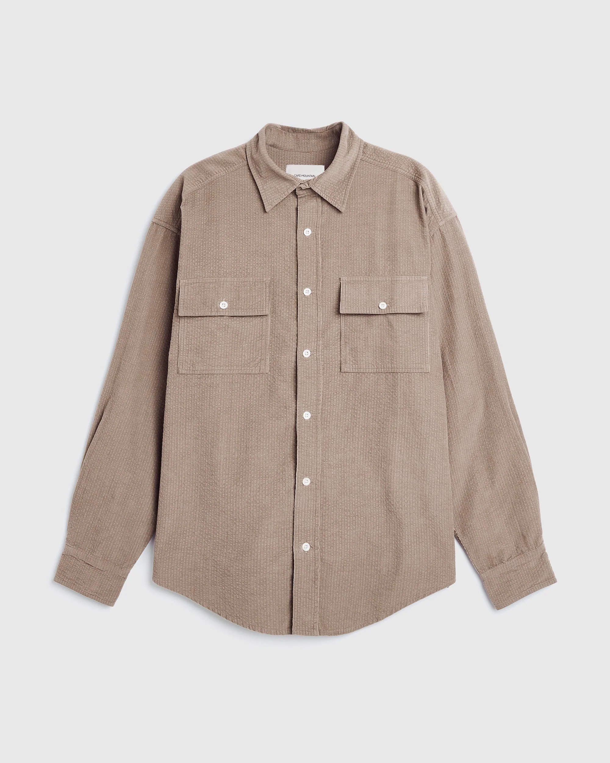CafeTemplateCafe-Mountain_ParisShow_SS26_1DOUBLE-POCKET-SEERSUCKER-CORD-HERITAGE-SHIRT_OAT.jpg
