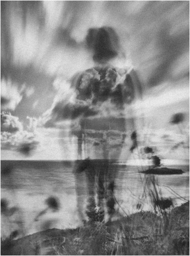A woman looking out at the open sea, symbolizing self-reflection and the subconscious.