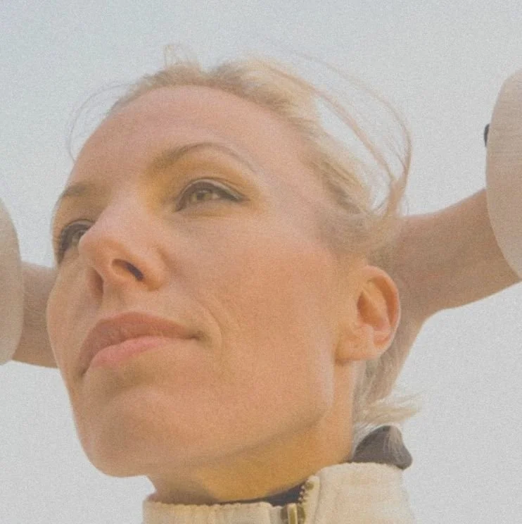 A professional headshot of Elisabeth Paul, psychological astrologer.