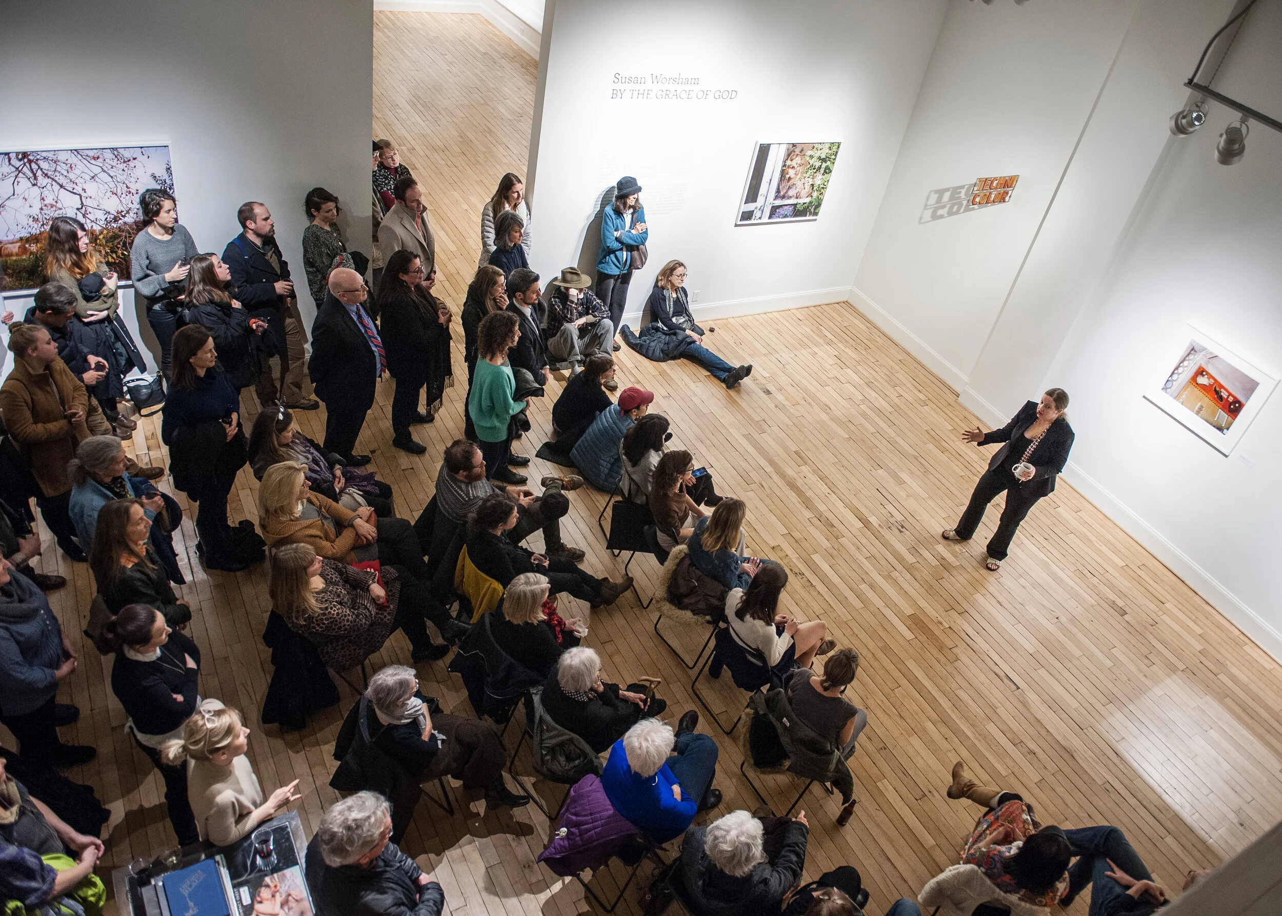 Susan Worsham gives an artist talk during her exhibition, By the Grace of God, at Candela Gallery.