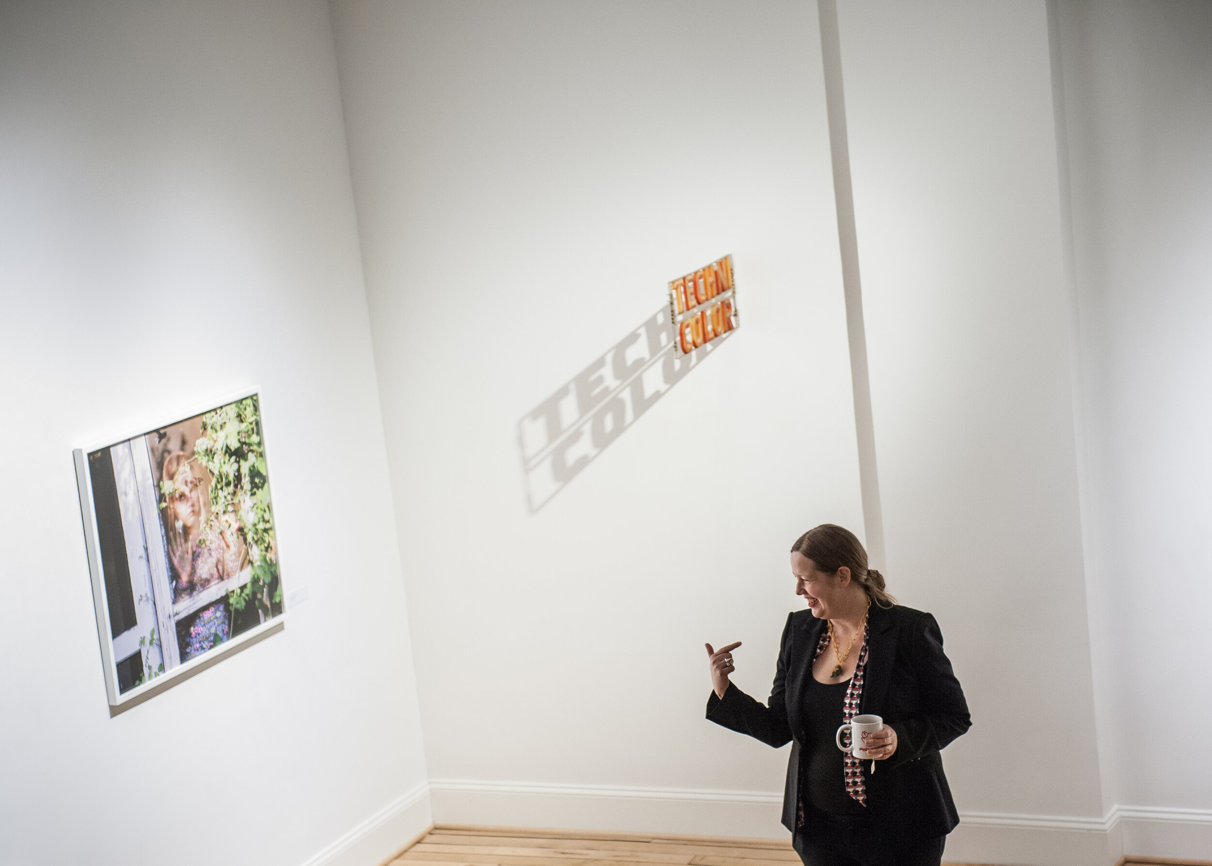 Susan Worsham gives an artist talk during her exhibition, By the Grace of God, at Candela Gallery.