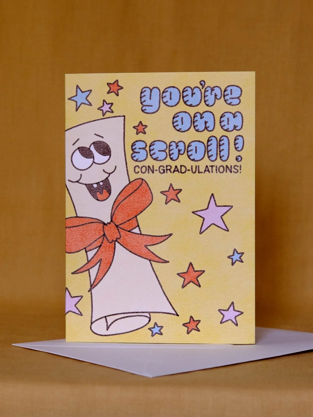 retro-illustration-greeting-graduation-you're-on-a-scroll-1.jpg