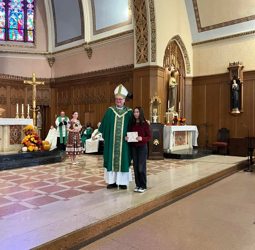Elise, Saint Patrick School 8th grade student, was honored for her artwork this past weekend as a finalist in the Christmas Artwork Contest of 24-25 and was presented a certificate by Archbishop Henning. Congratulations to you, Elise!

#preschool #sc