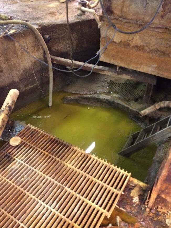The pit of hazardous waste in the basement of 945 E. Ten Mile Road from 2017. Courtesy of U.S. EPA.