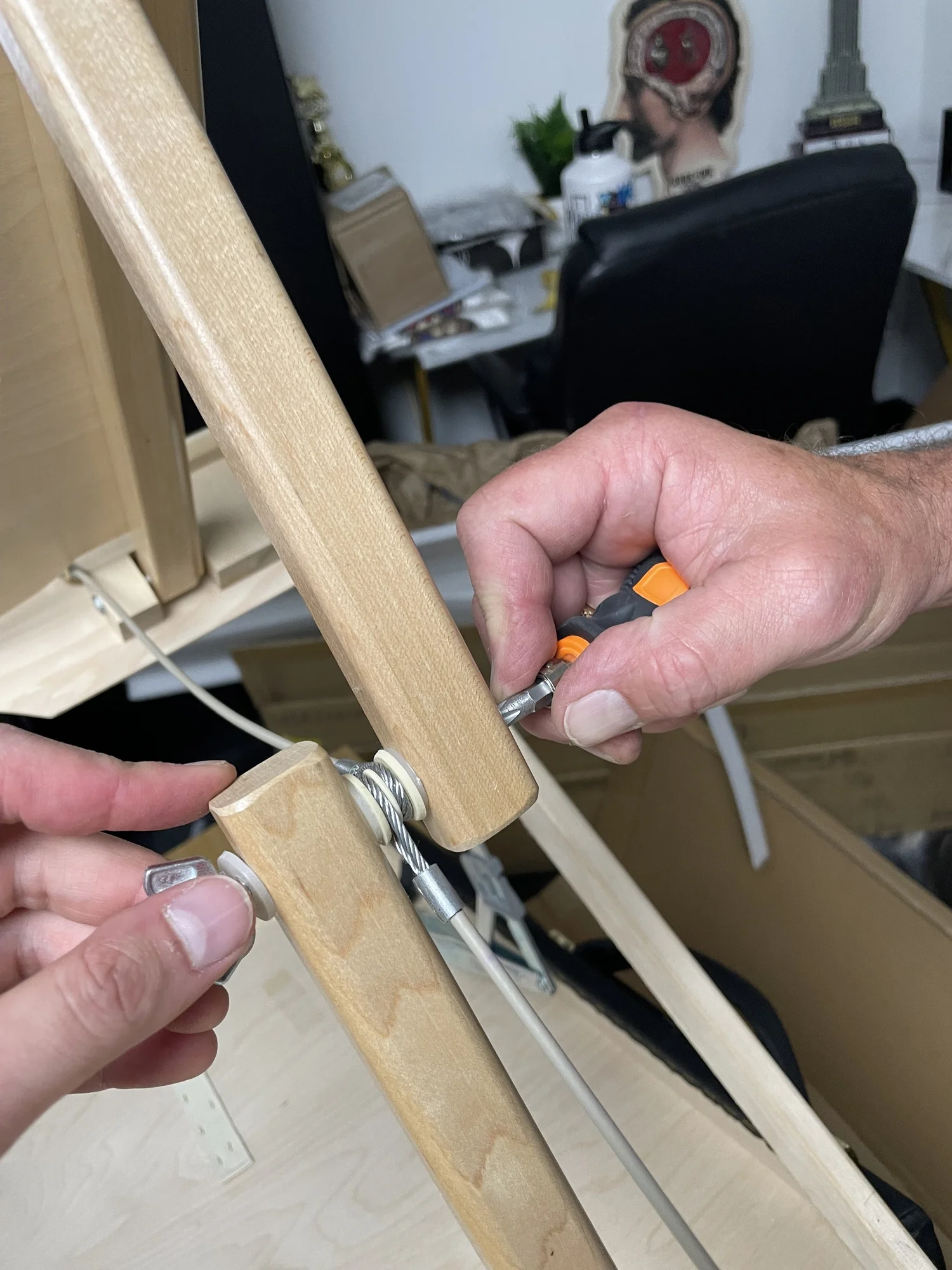 Disassembled tether removed from massage table