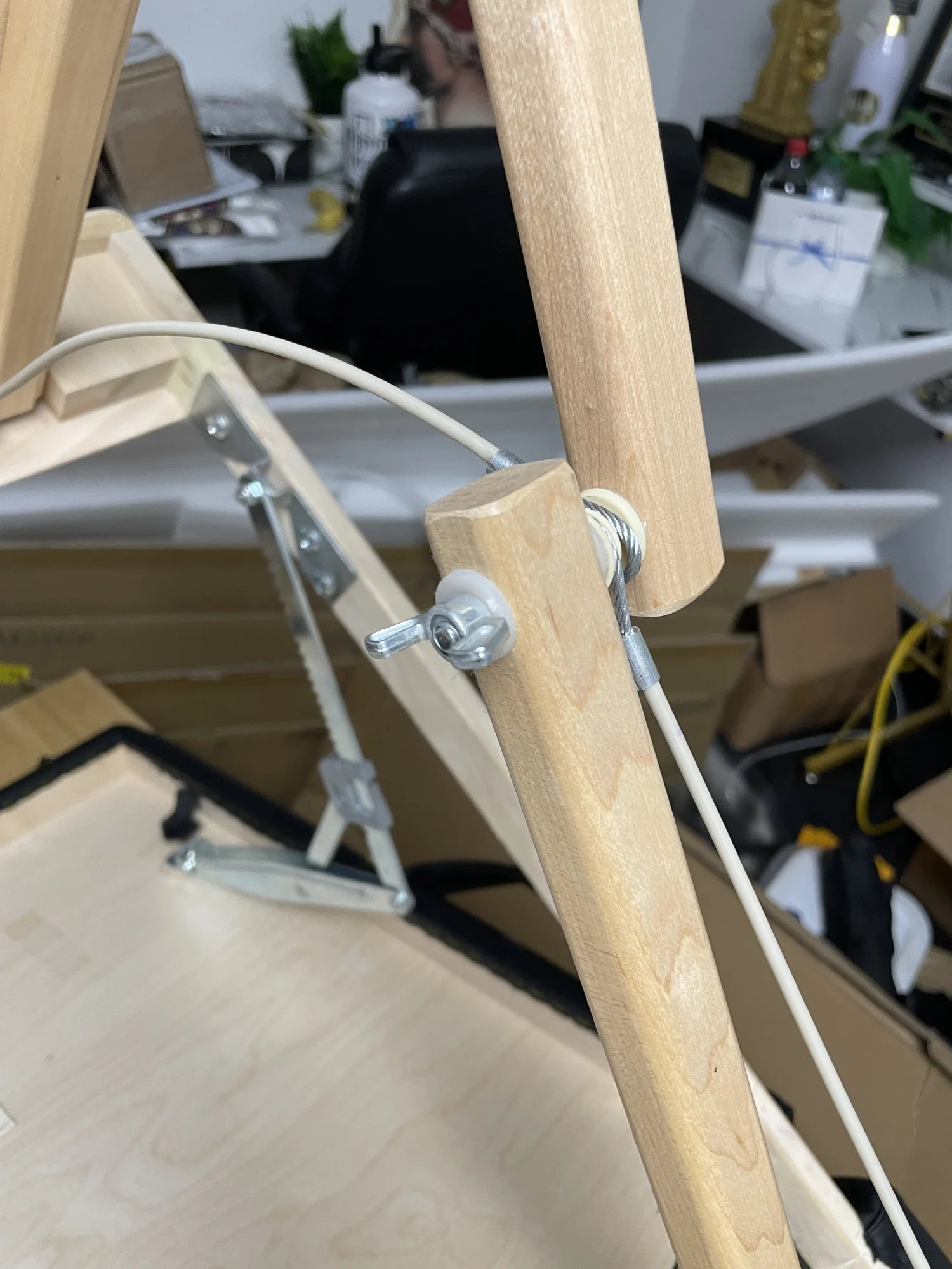 Removing wing nut with screwdriver to prevent spinning