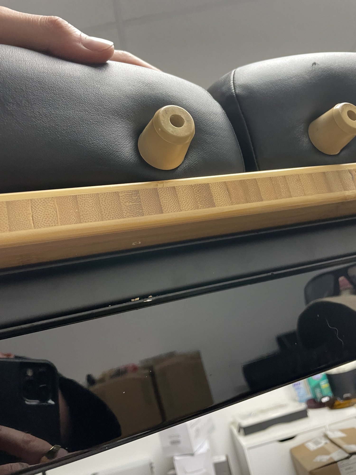 Driving screw from underneath tabletop into massage table