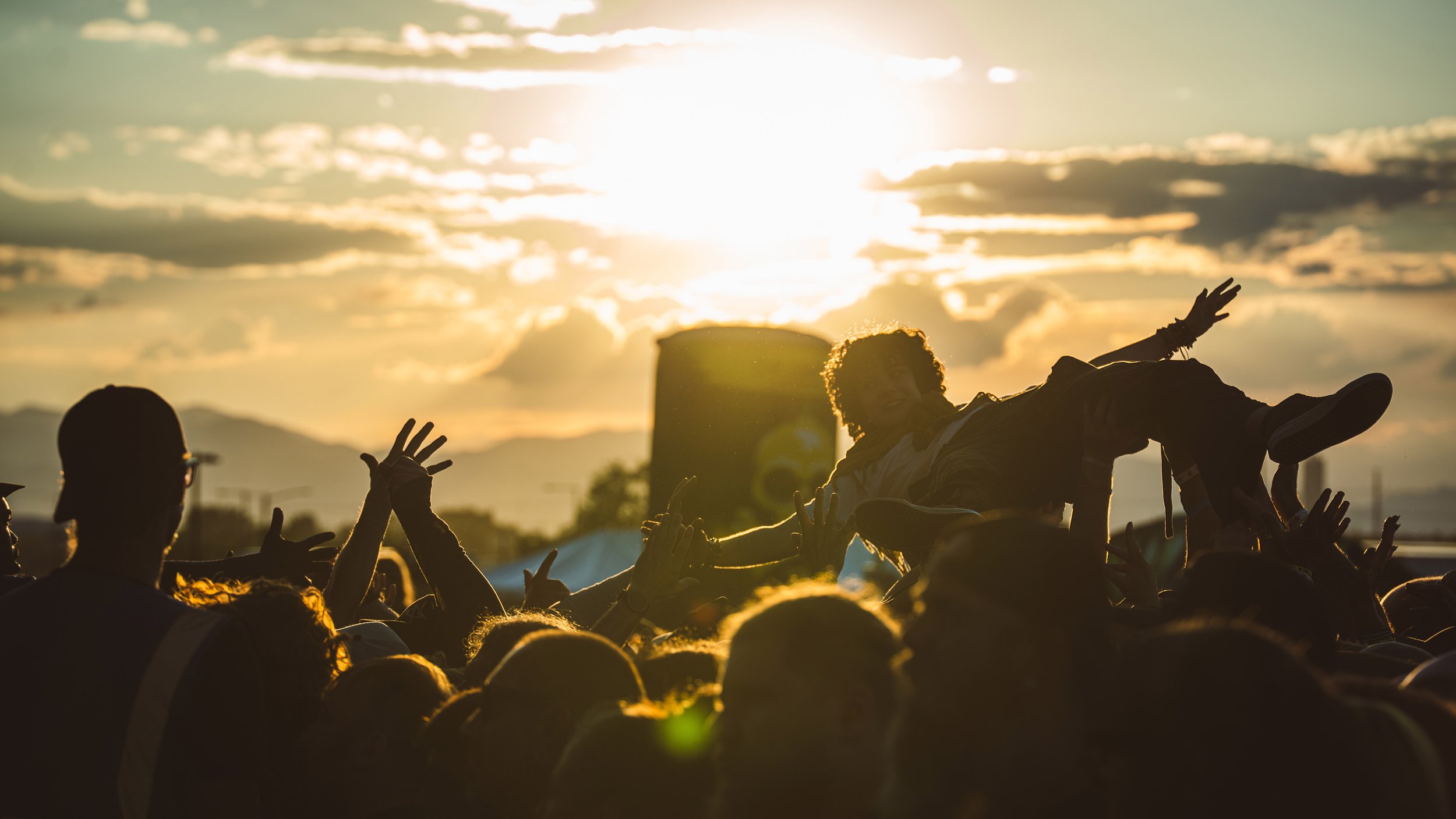 Sunset Crowd Surfer