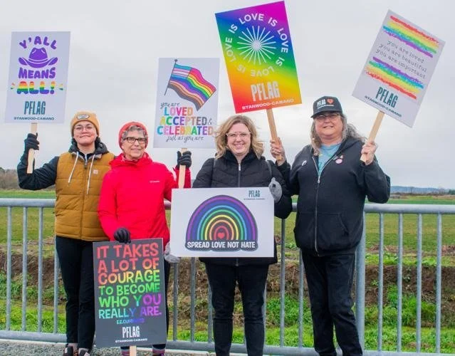 PFLAG Skagit members holding signs