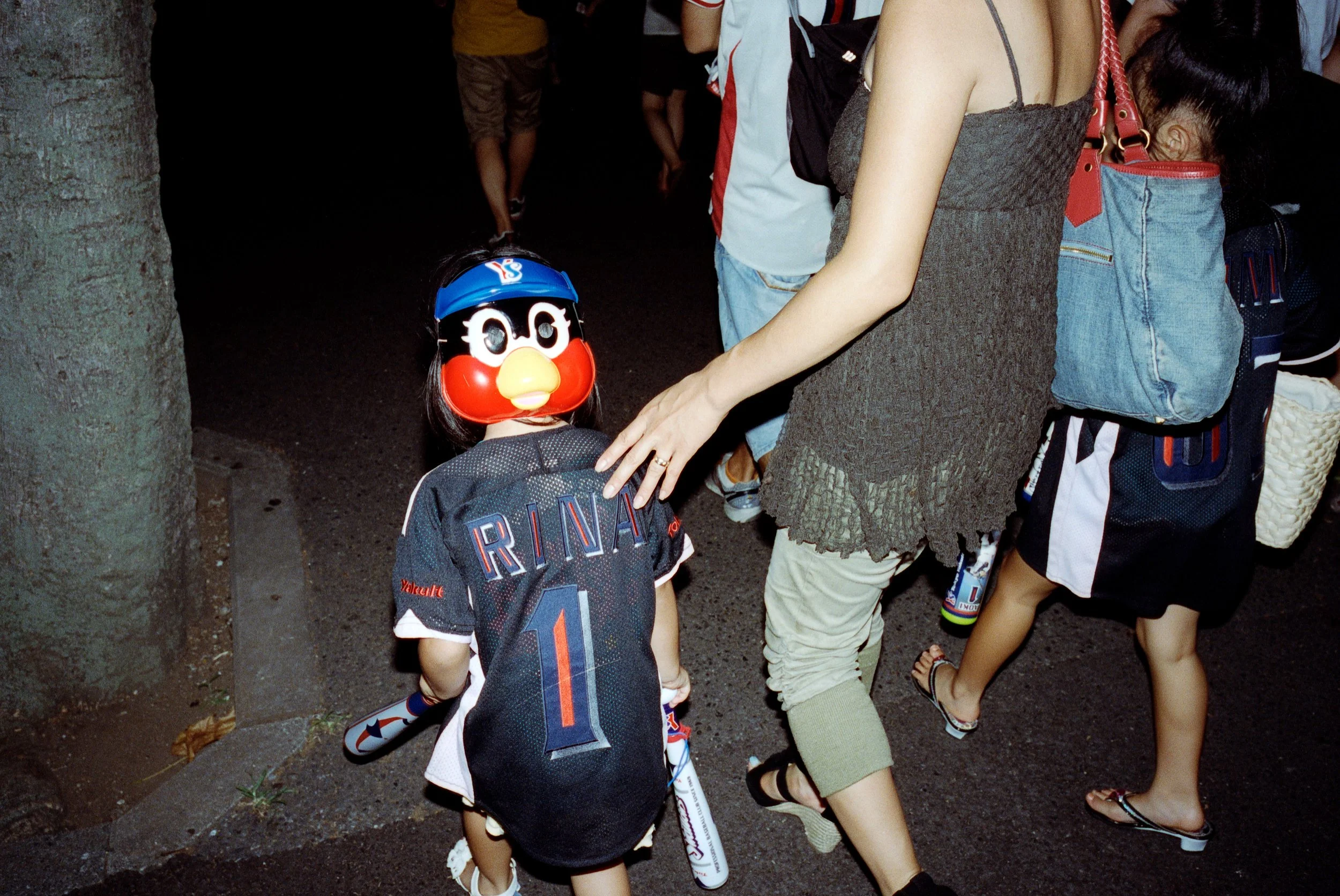 Documentary photograph taken by London based photographer Maxwell Anderson in Tokyo Japan at a baseball yakyu game between Tokyo Swallows and Hanshin Tigers of Osaka