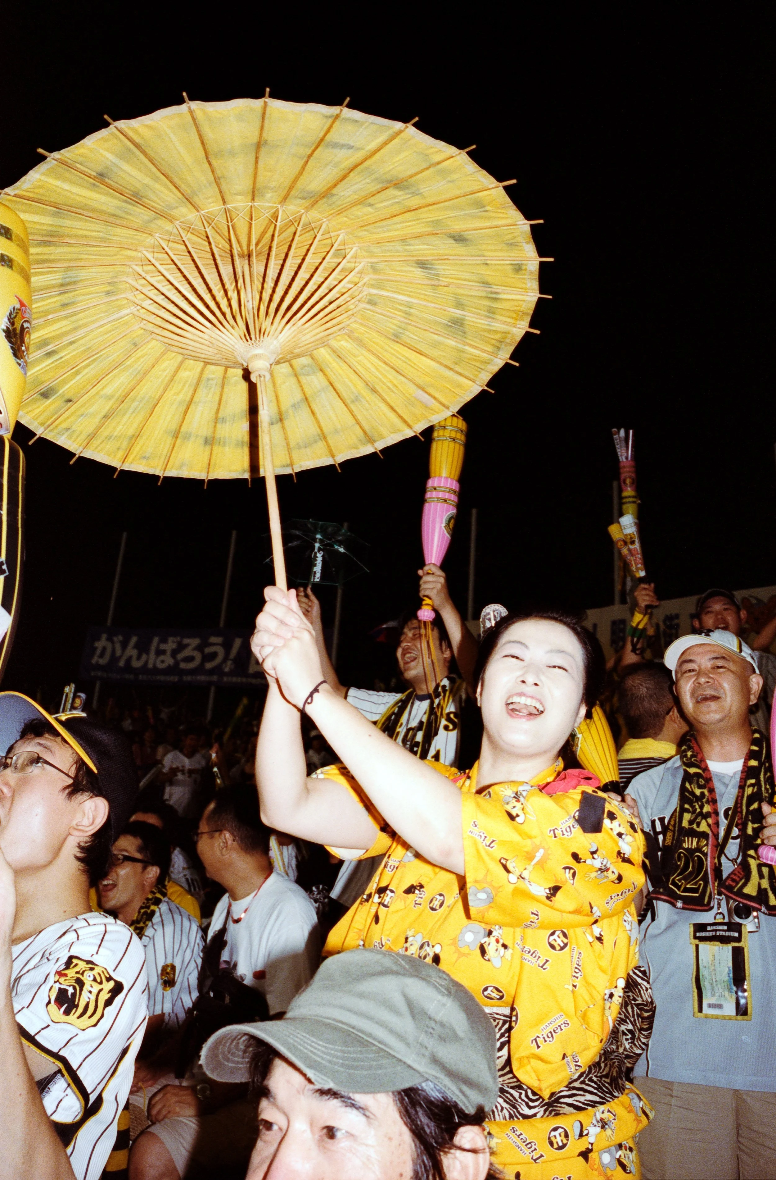 Documentary photograph taken by London based photographer Maxwell Anderson in Tokyo Japan at a baseball yakyu game between Tokyo Swallows and Hanshin Tigers of Osaka