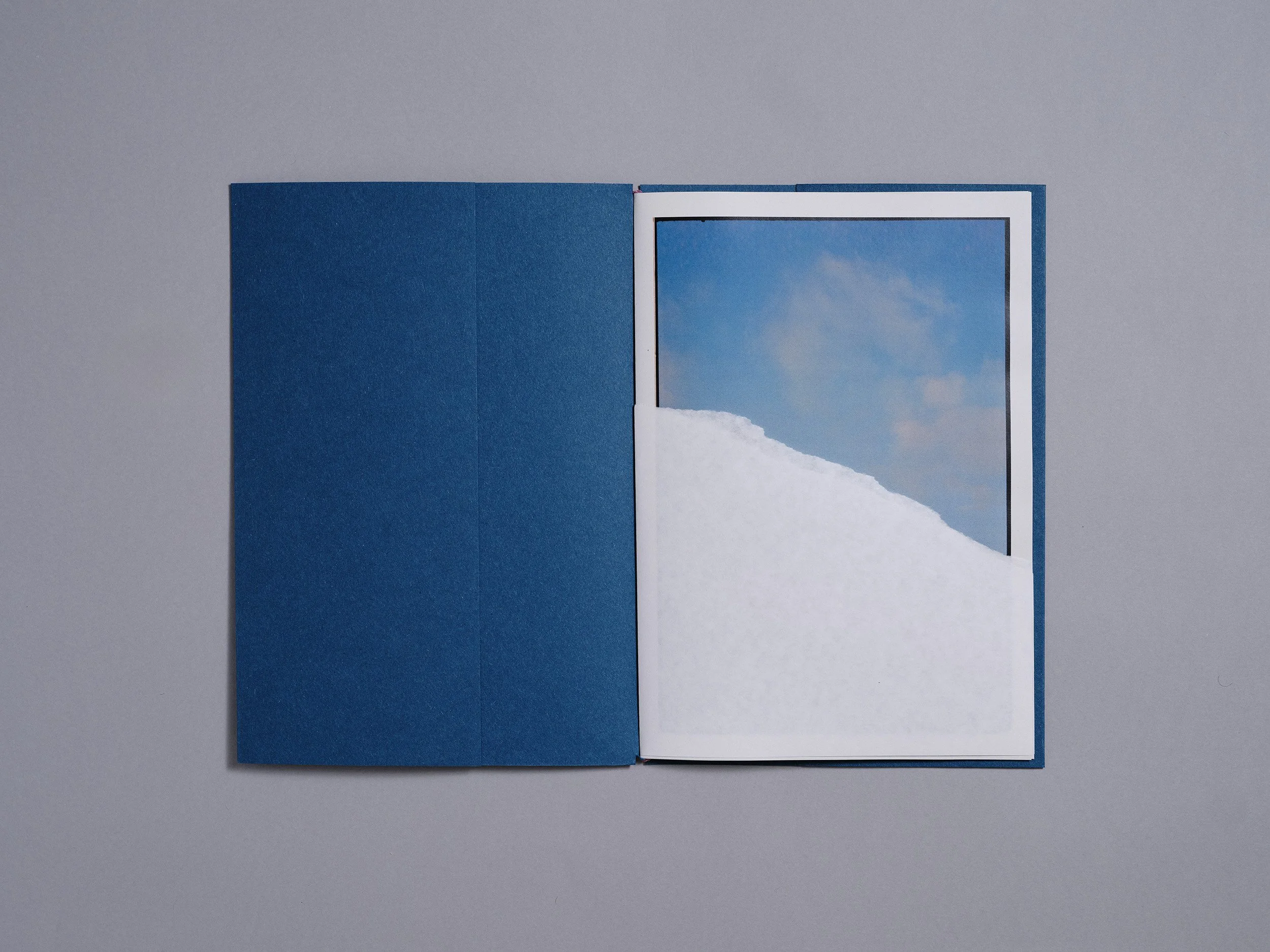 A hand made printed photobook zine of photographs and a poem, hand made by London based artist and photographer Maxwell Anderson