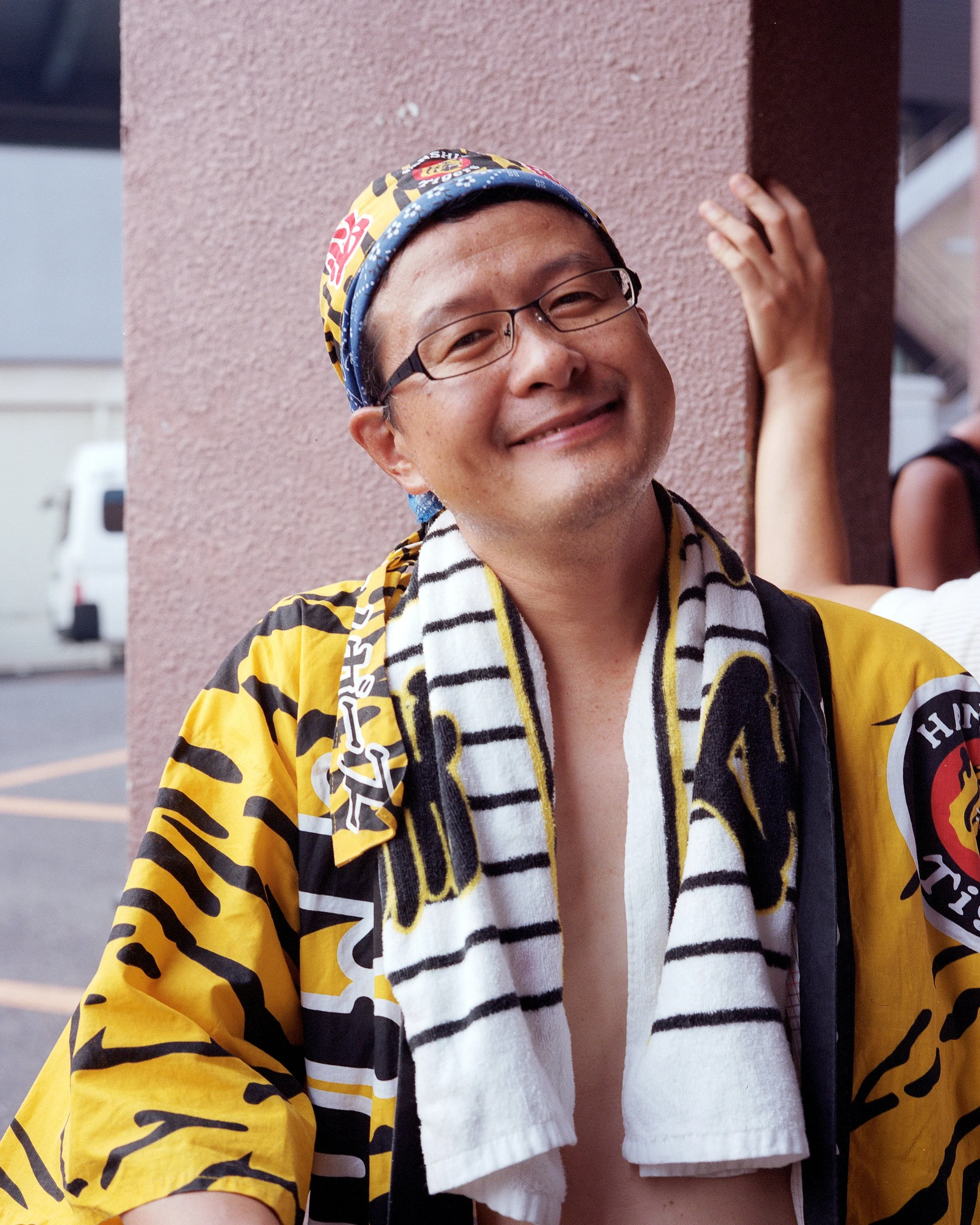 Documentary photograph taken by London based photographer Maxwell Anderson in Tokyo Japan at a baseball yakyu game between Tokyo Swallows and Hanshin Tigers of Osaka