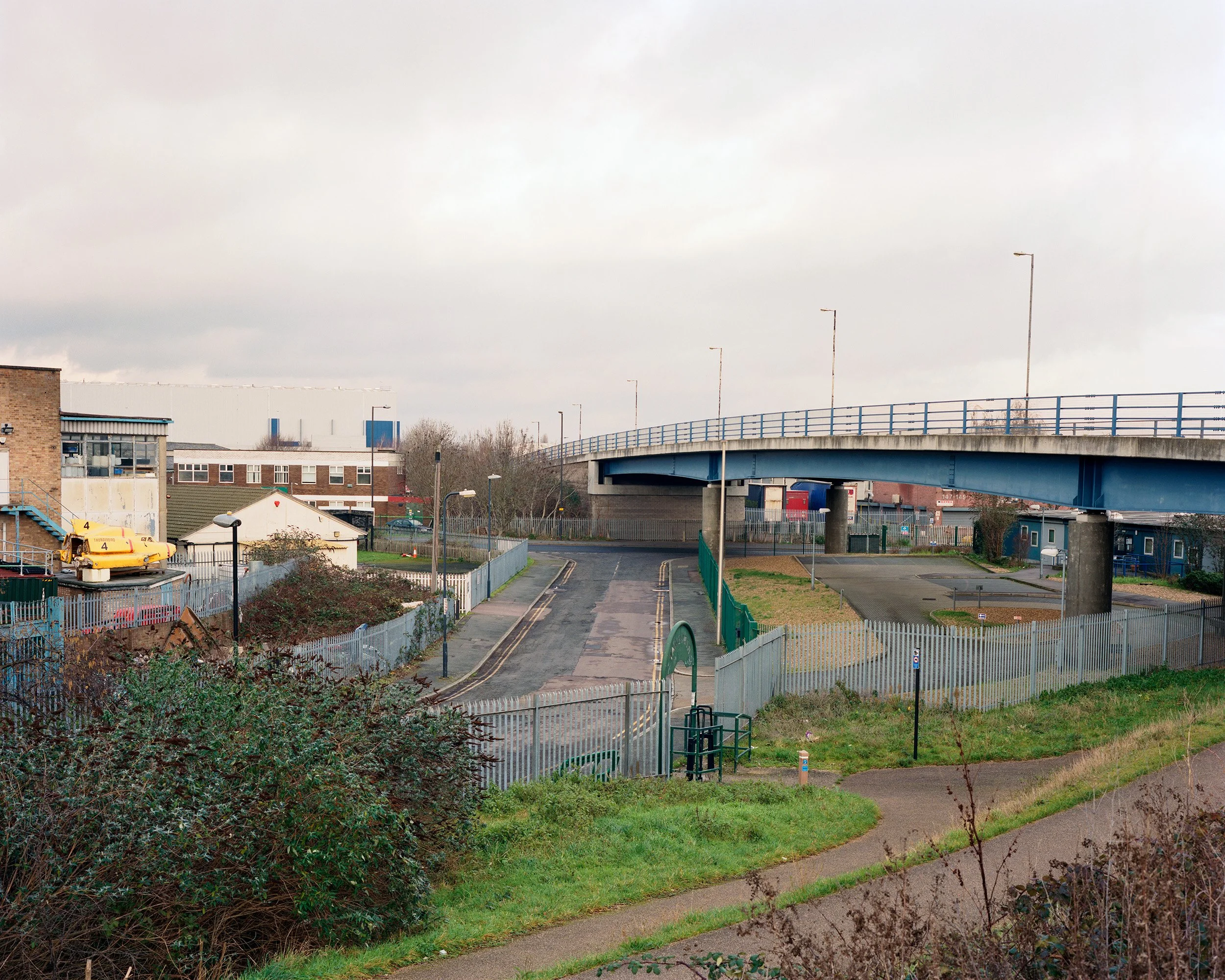 Landscape photograph by photographer Maxwell Anderson taken in Thamesmead South East London featuring a bridge and a Thunderbirds ship
