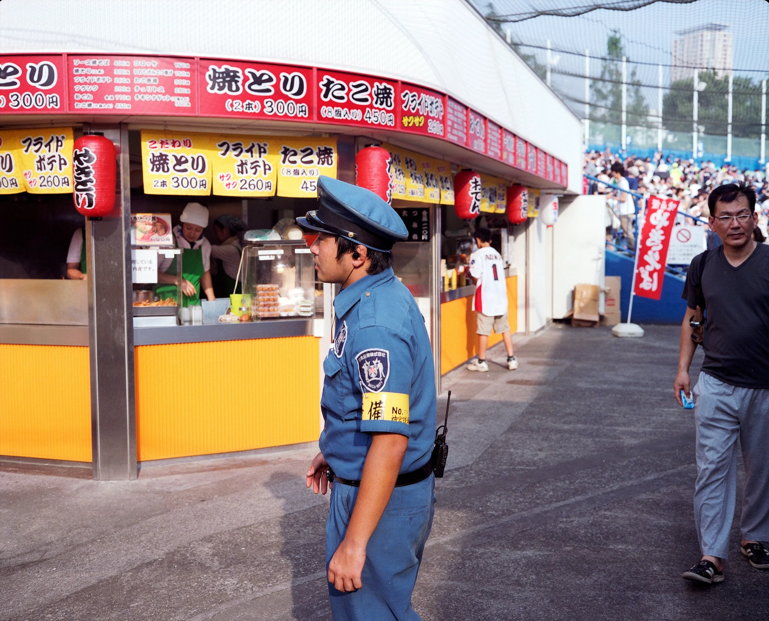 Documentary photograph taken by London based photographer Maxwell Anderson in Tokyo Japan at a baseball yakyu game between Tokyo Swallows and Hanshin Tigers of Osaka