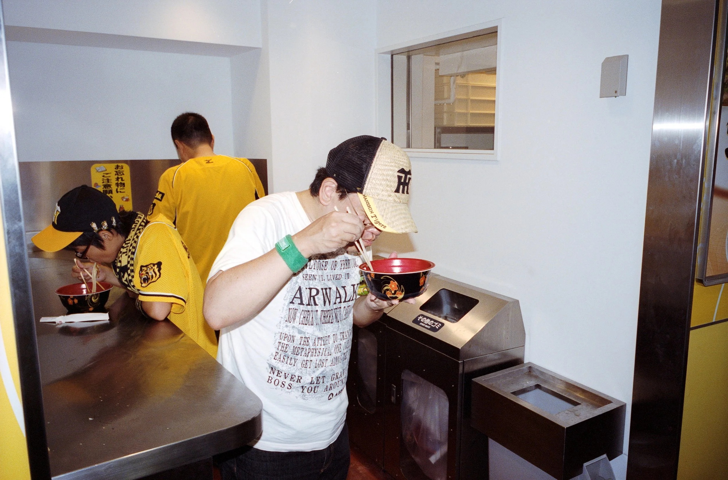Documentary photograph taken by London based photographer Maxwell Anderson in Tokyo Japan at a baseball yakyu game between Tokyo Swallows and Hanshin Tigers of Osaka
