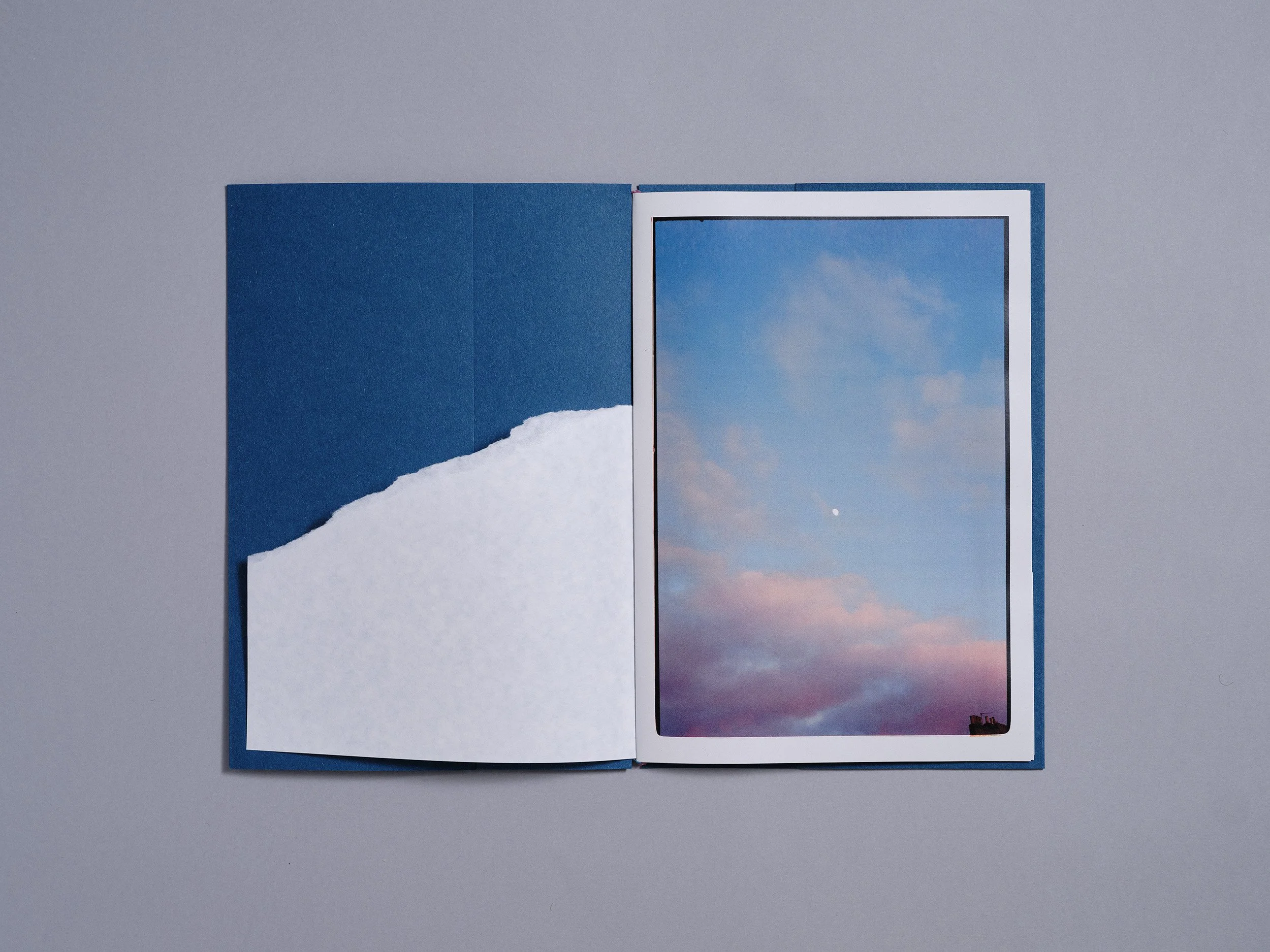 A hand made printed photobook zine of photographs and a poem, hand made by London based artist and photographer Maxwell Anderson