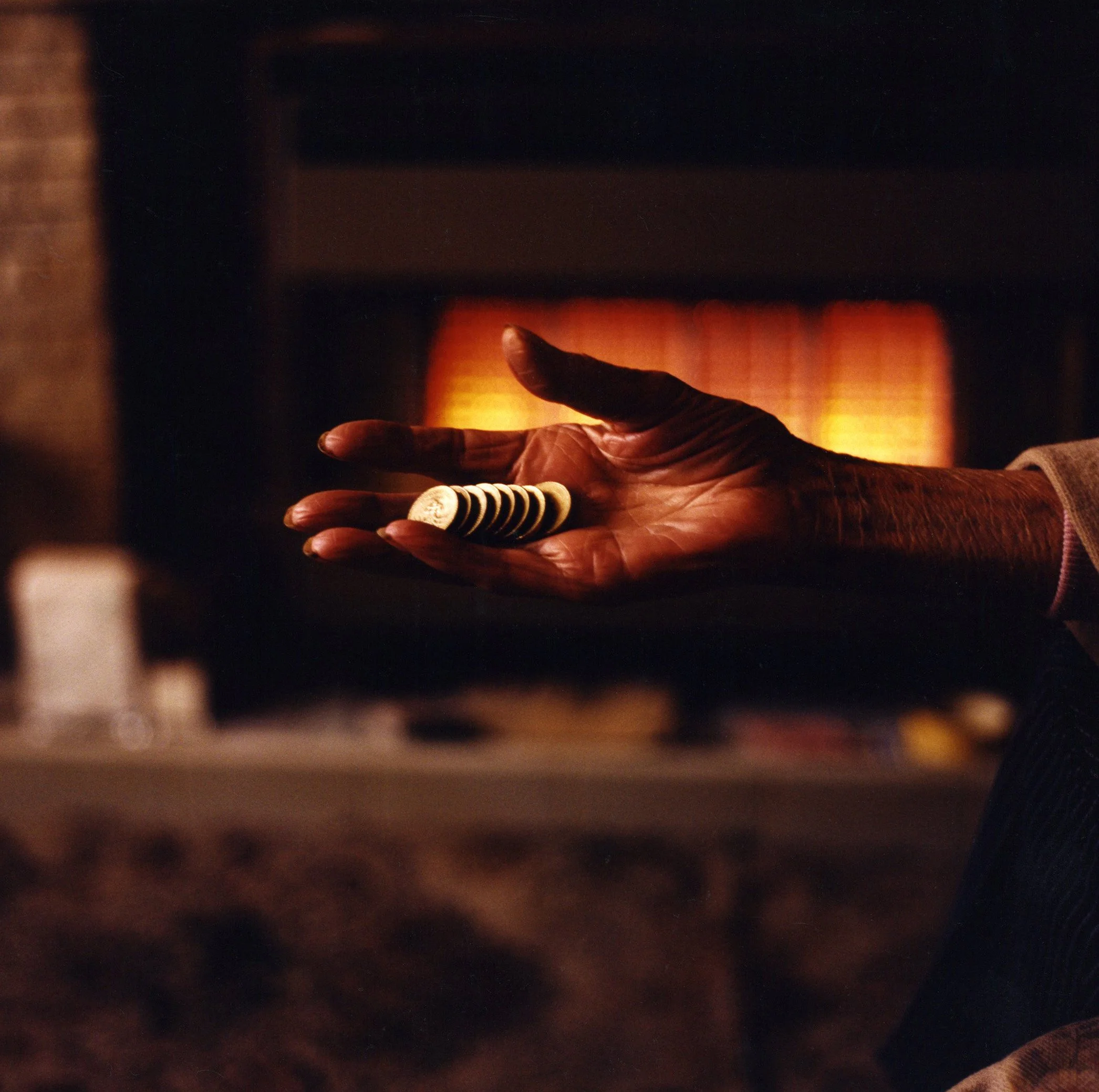 Hand with pound coins