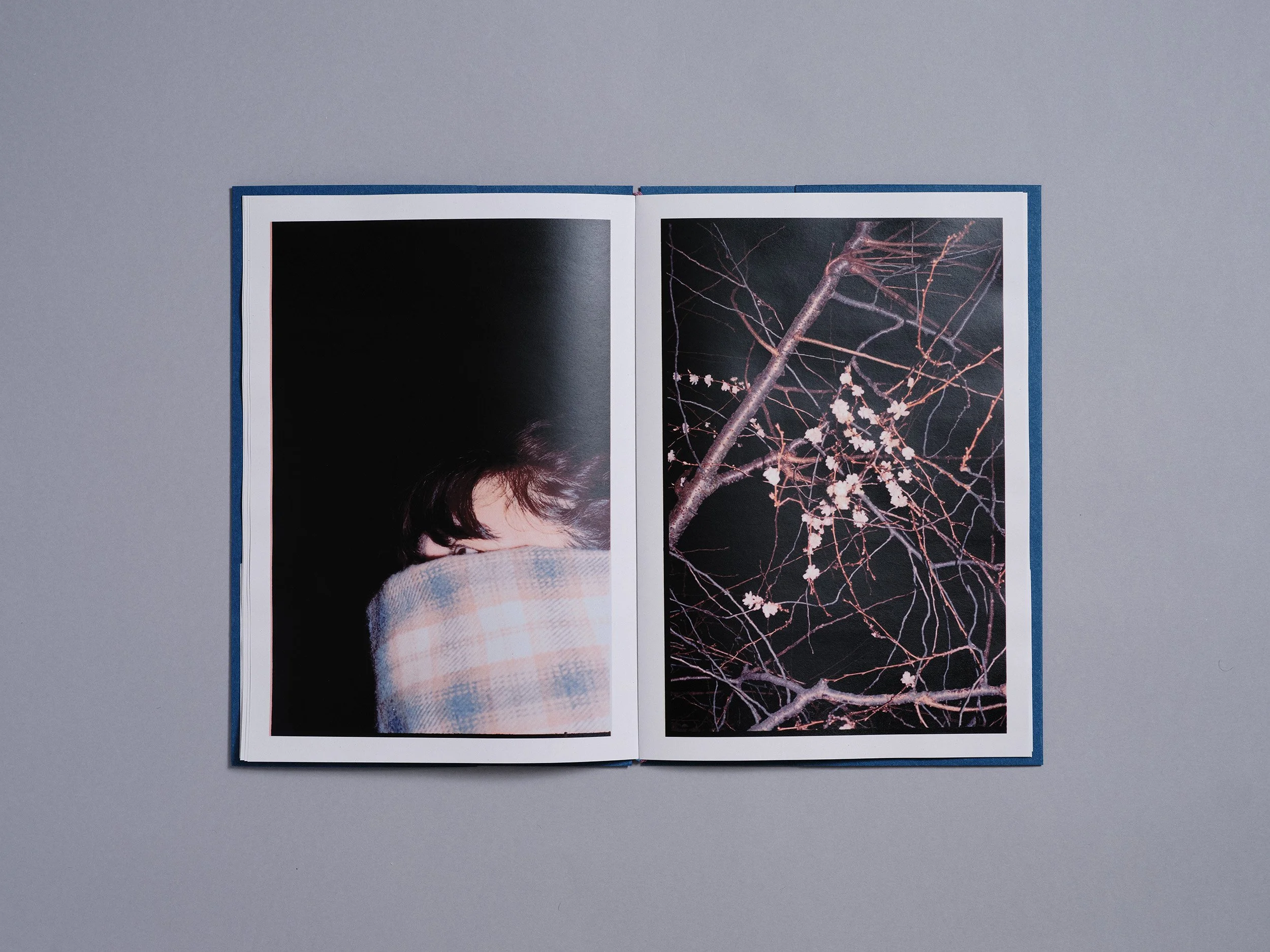 A hand made printed photobook zine of photographs and a poem, hand made by London based artist and photographer Maxwell Anderson