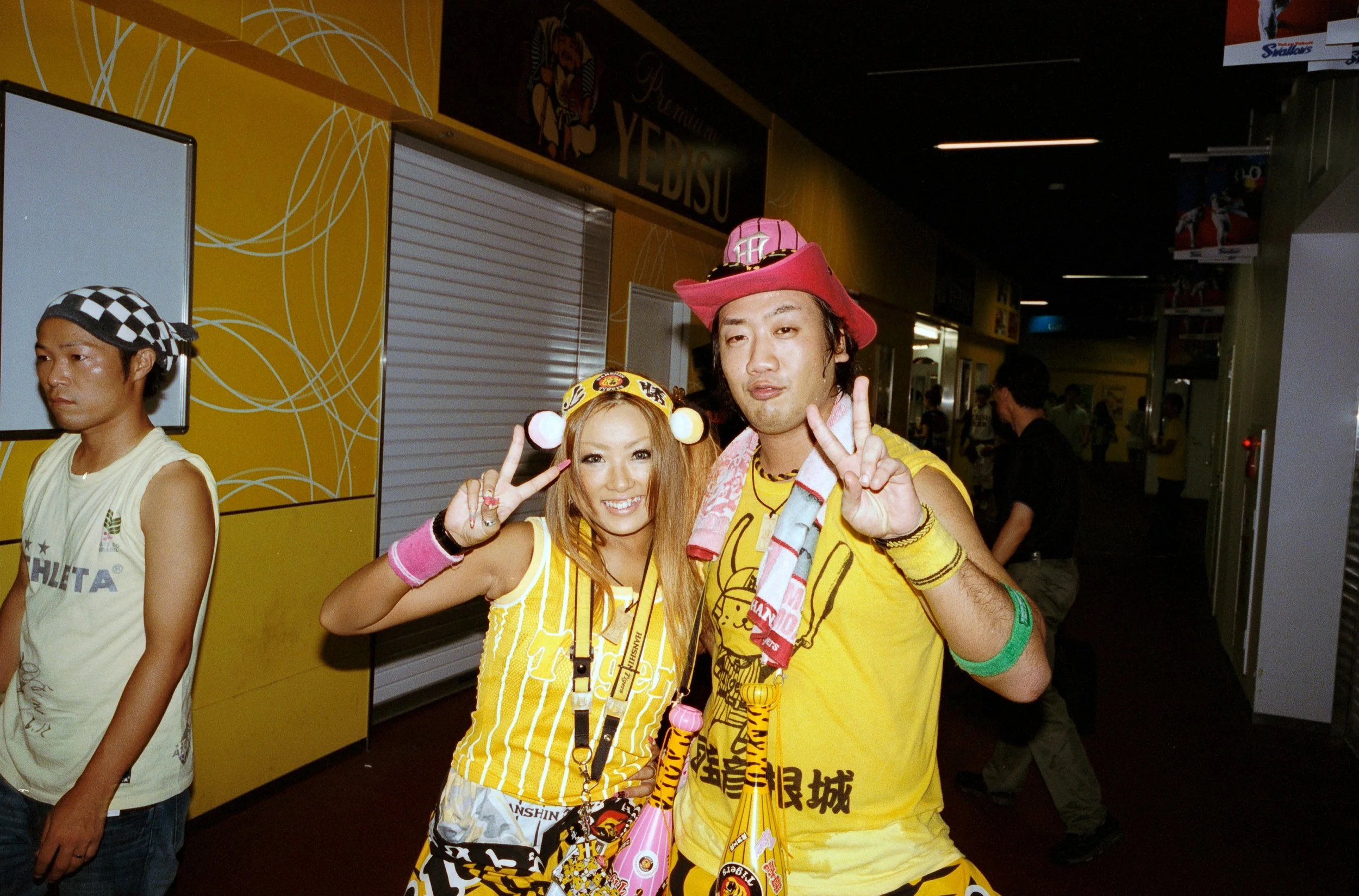 Documentary photograph taken by London based photographer Maxwell Anderson in Tokyo Japan at a baseball yakyu game between Tokyo Swallows and Hanshin Tigers of Osaka