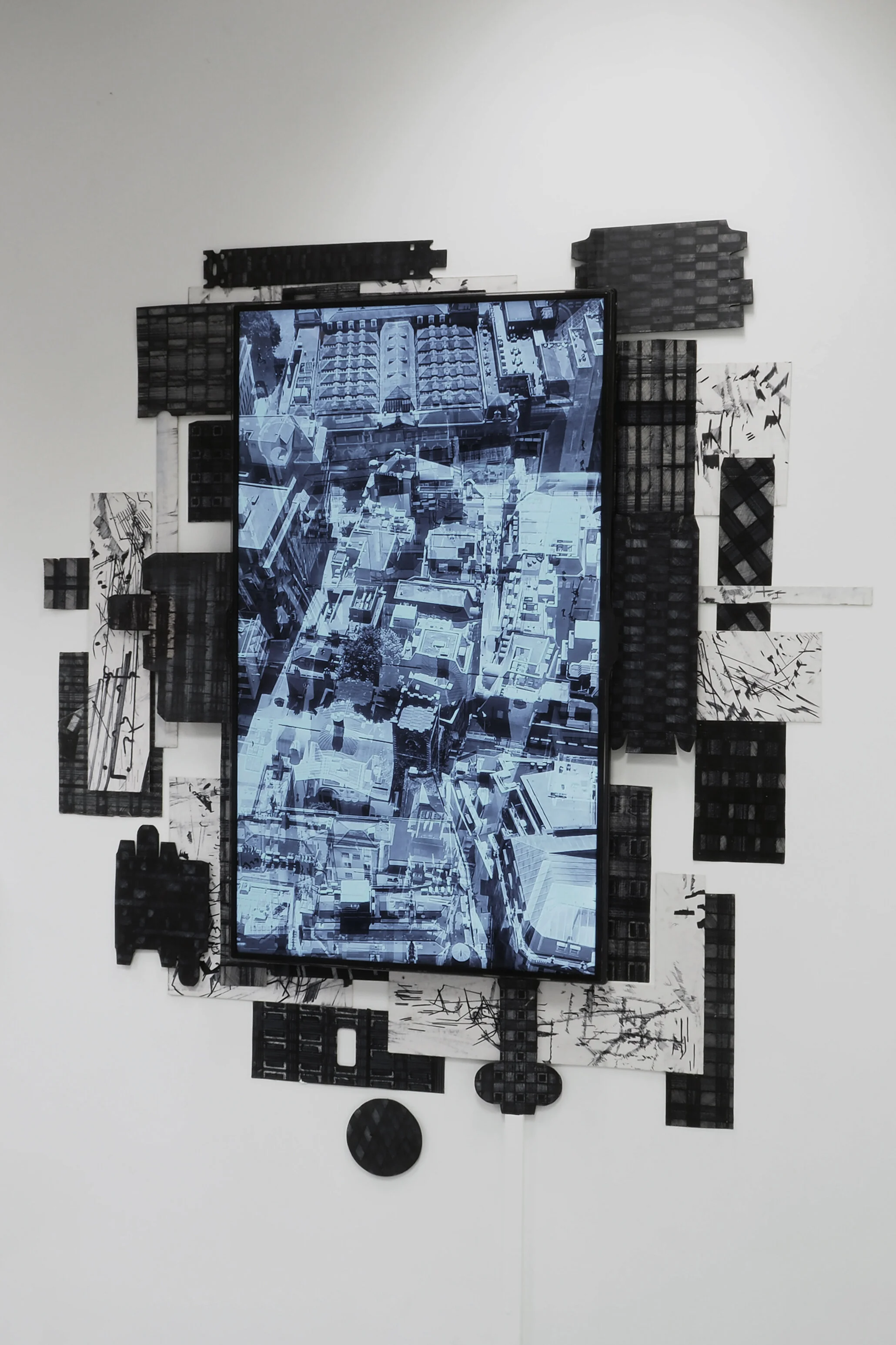 Urban Camouflage 01, 82(w)cm x 112(h)cm x 2(d)cm, Acrylic and Pen on Found Objects, Single Monitor, 2018